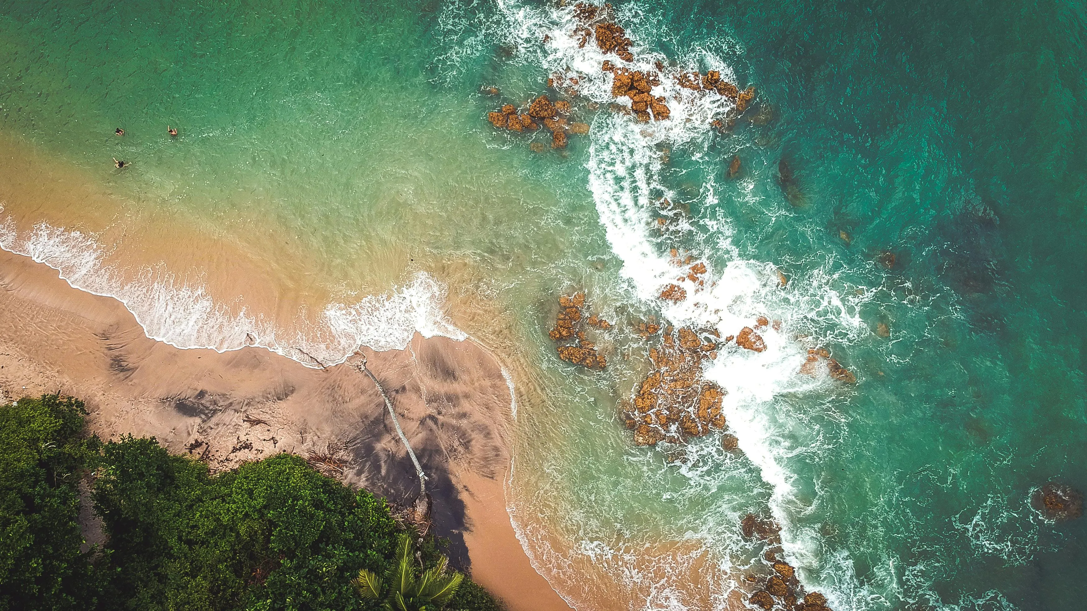 Golden Beach with Waves Crashing Along Cliffs Free Wallpaper