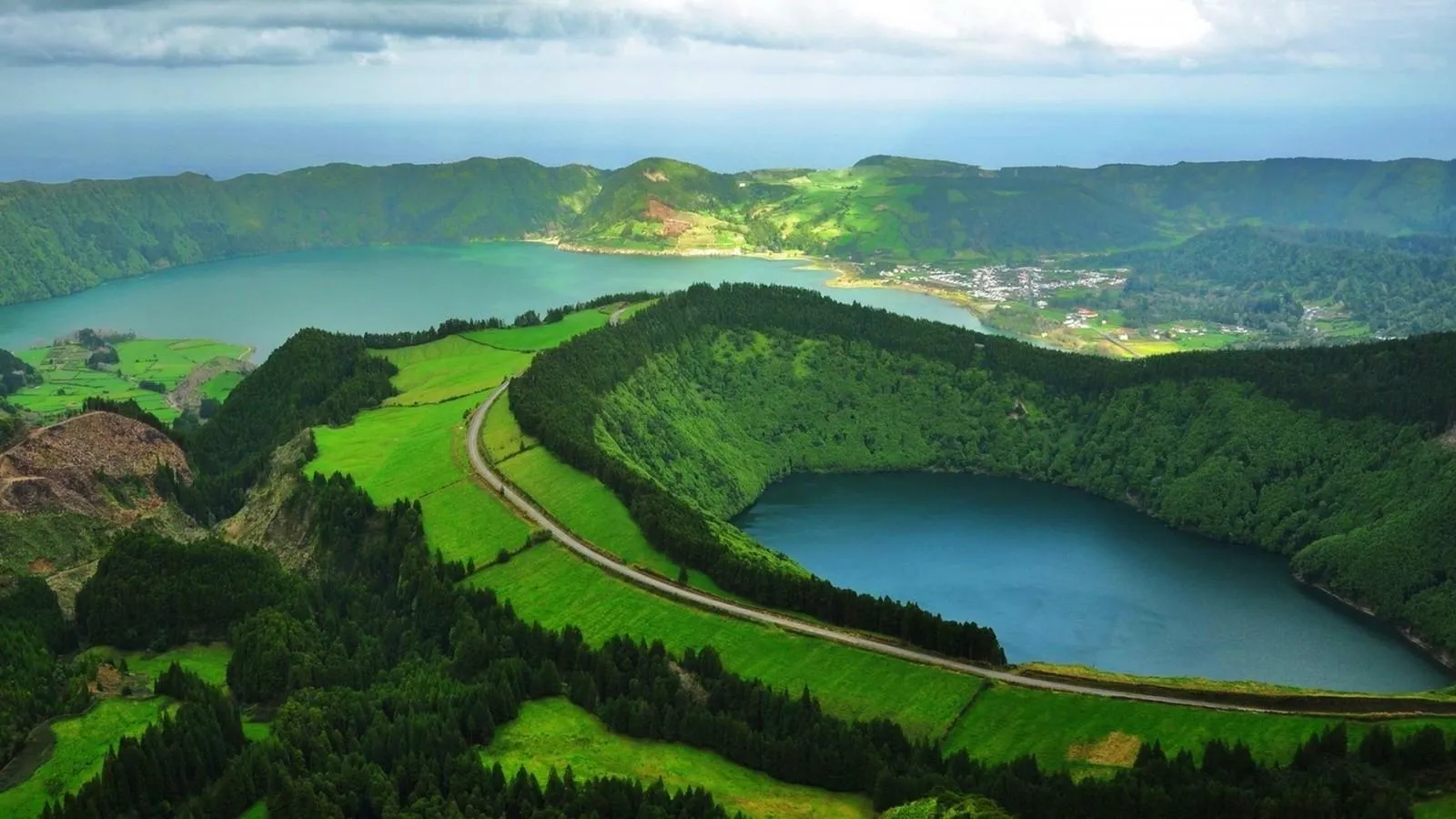 Green Hill Landscape with Volcanic Crater Lake Wallpaper