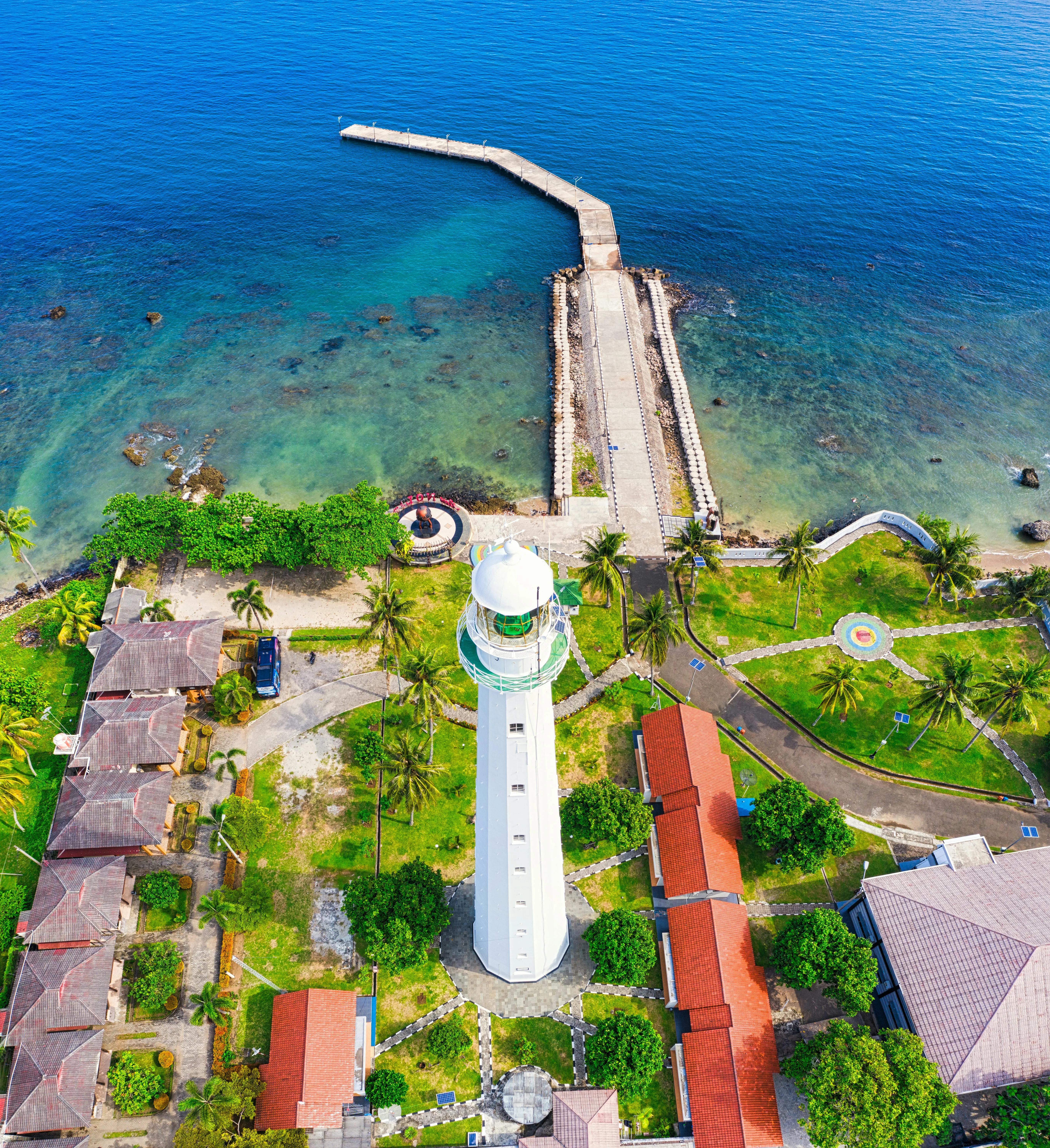 Historic Lighthouse Standing Tall on a Rocky Island