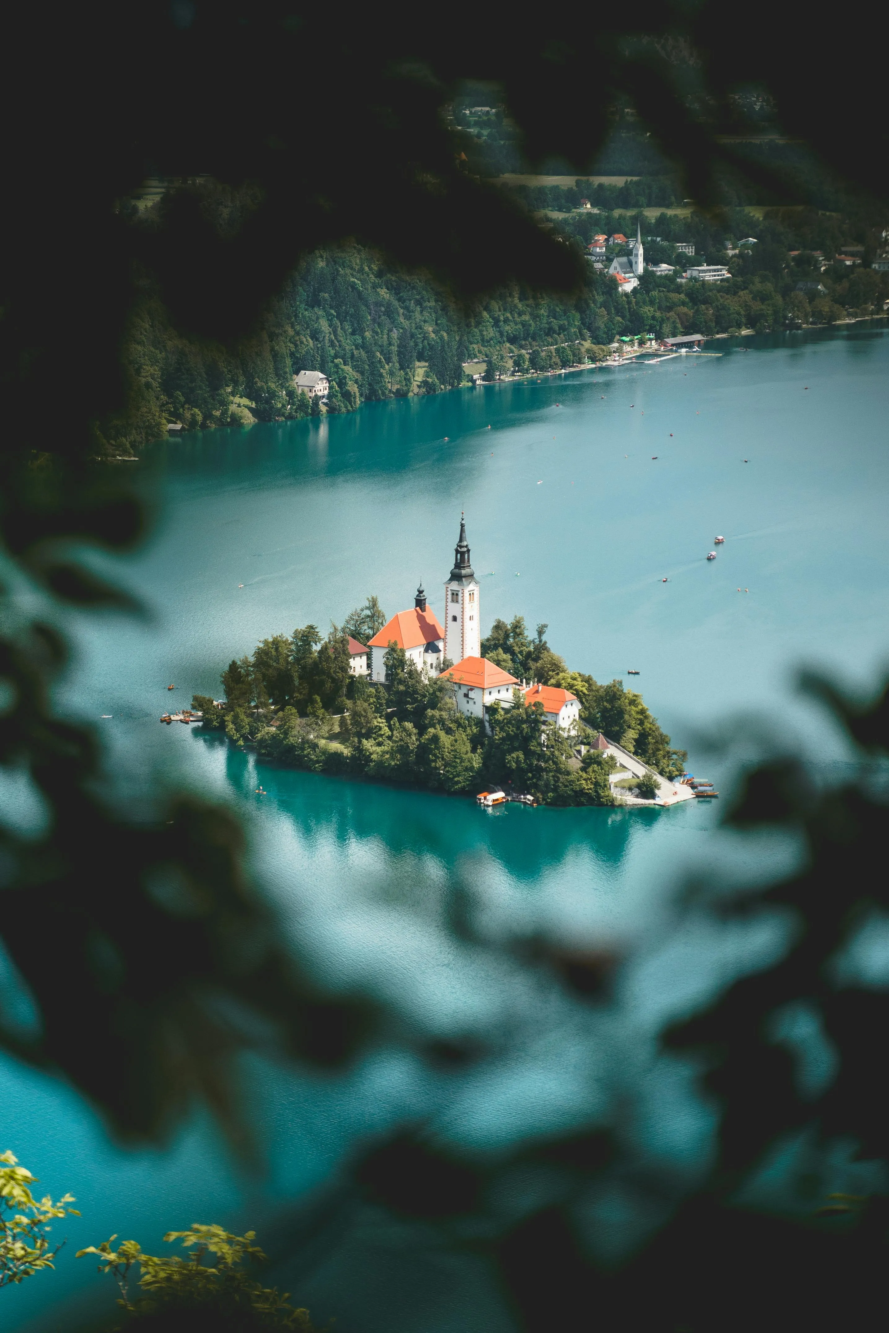 Island with Church Seen Through a Blurred Foreground Leaves