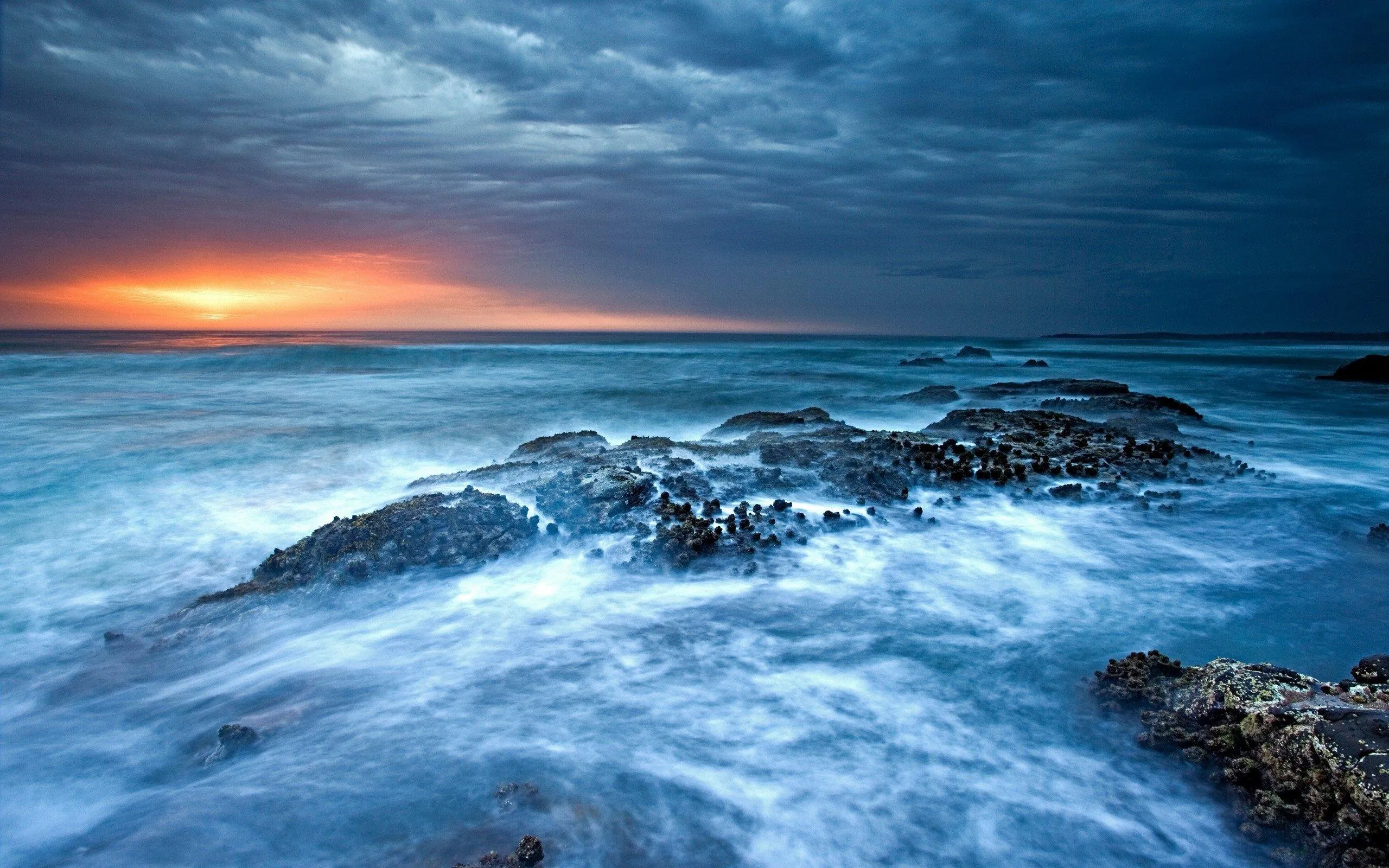 Long Exposure of an Ocean Wave Crashing into a Rock