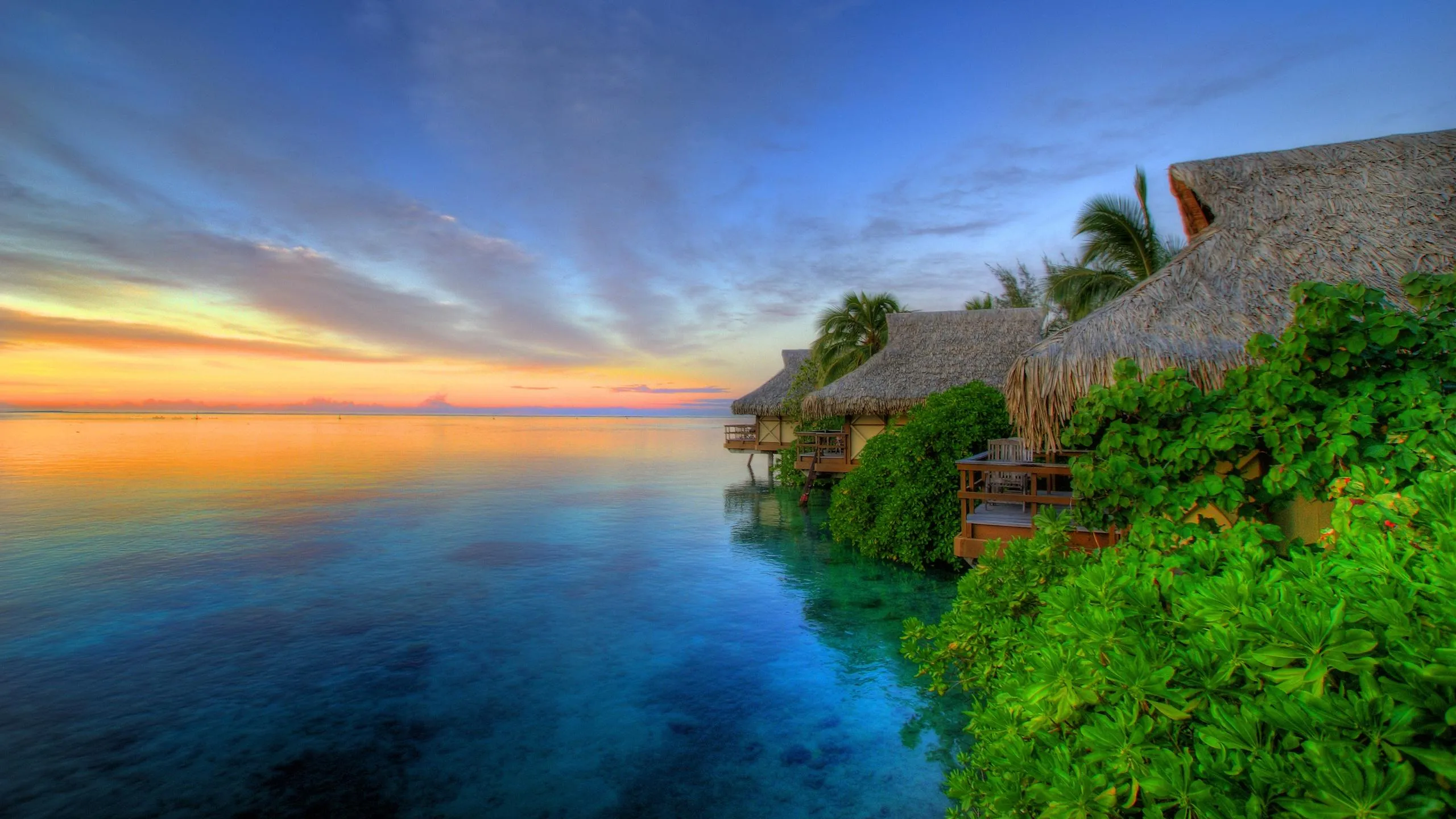 Luxury Beach Resort at Sunset with Vibrant Sky Colors