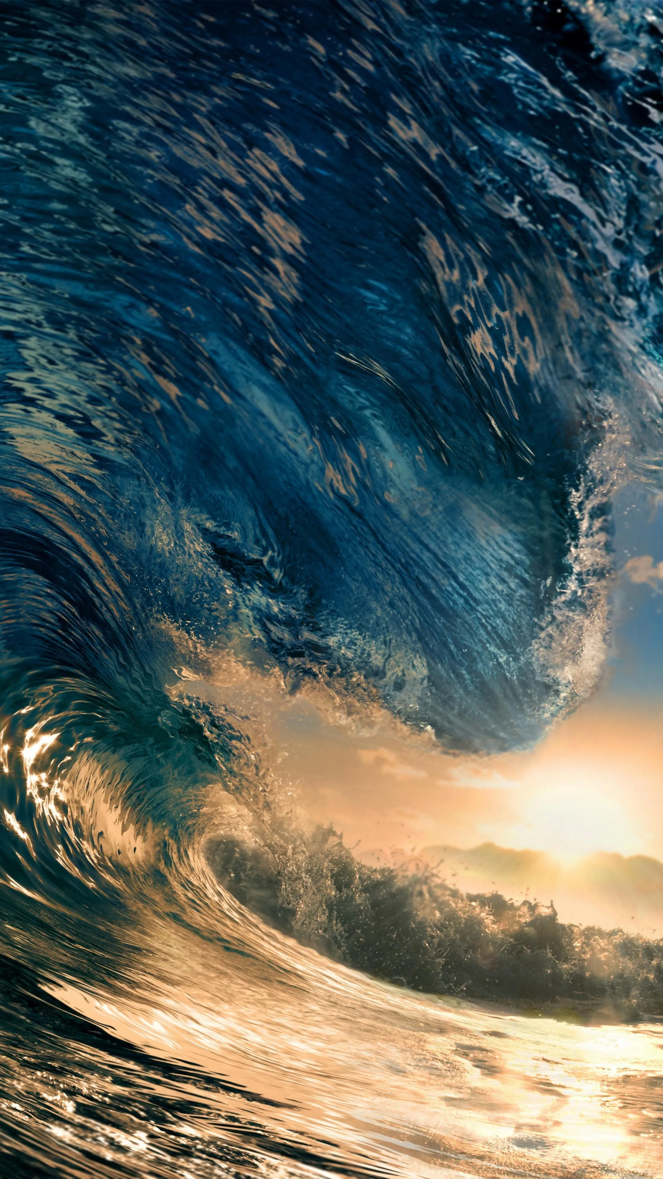 Massive Ocean Wave Curling During Golden Sunrise Wallpaper