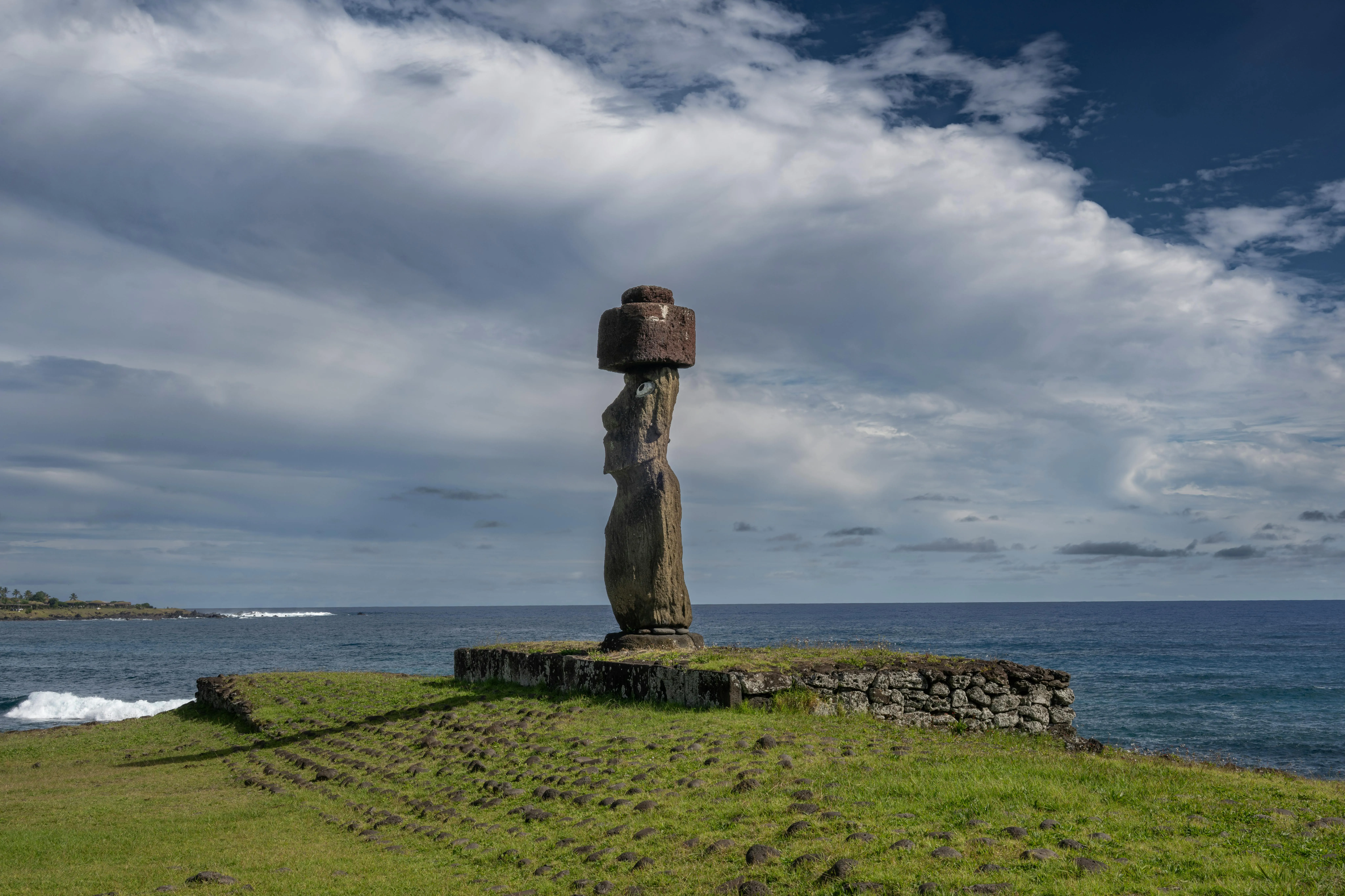 Moai Statue Stands by the Sea Under the Blue Sky Wallpaper