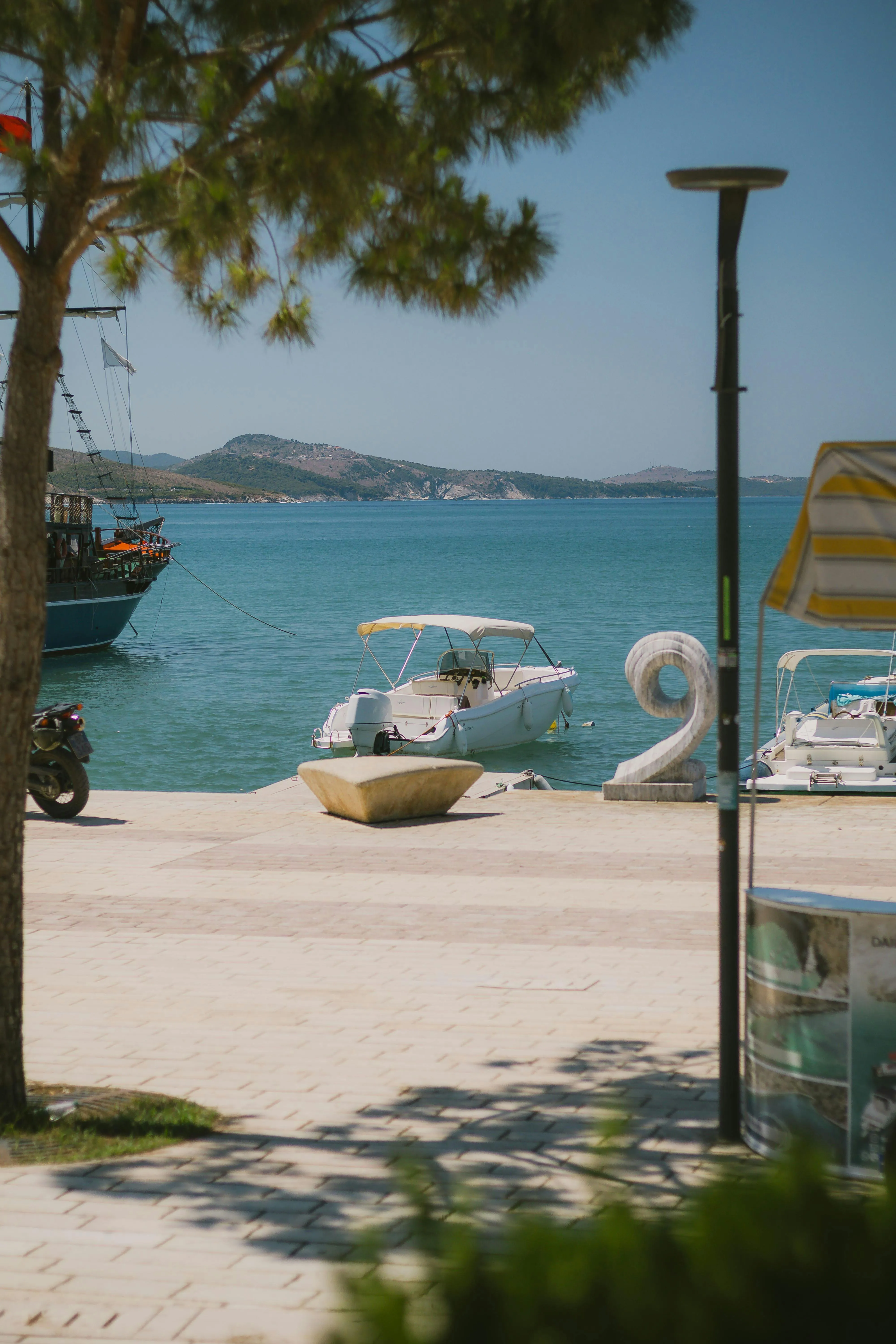 Peaceful Private Beach with Boats Download Free Wallpaper