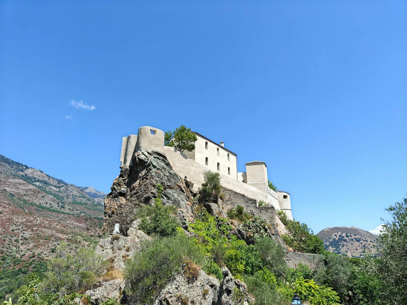 Stone Castle Perched on a Hilltop Free HD Wallpaper