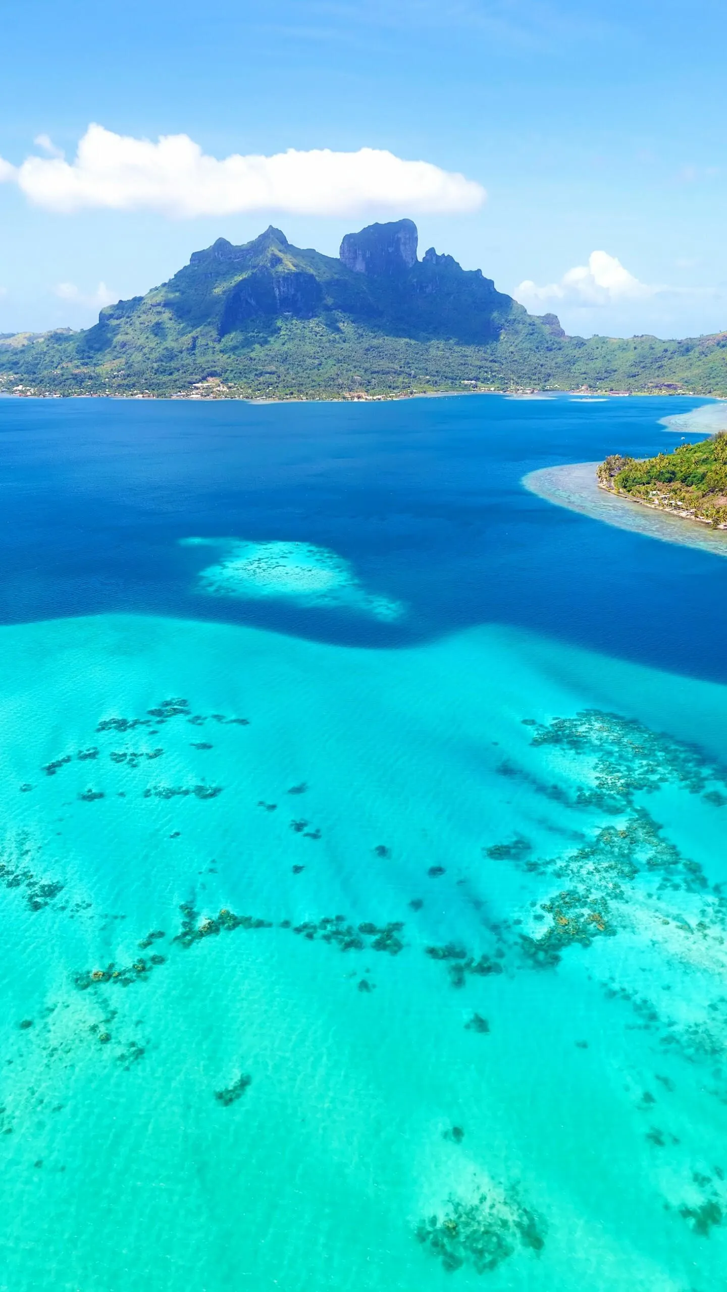 Stunning Aerial View of Turquoise Sea and Coral Reefs