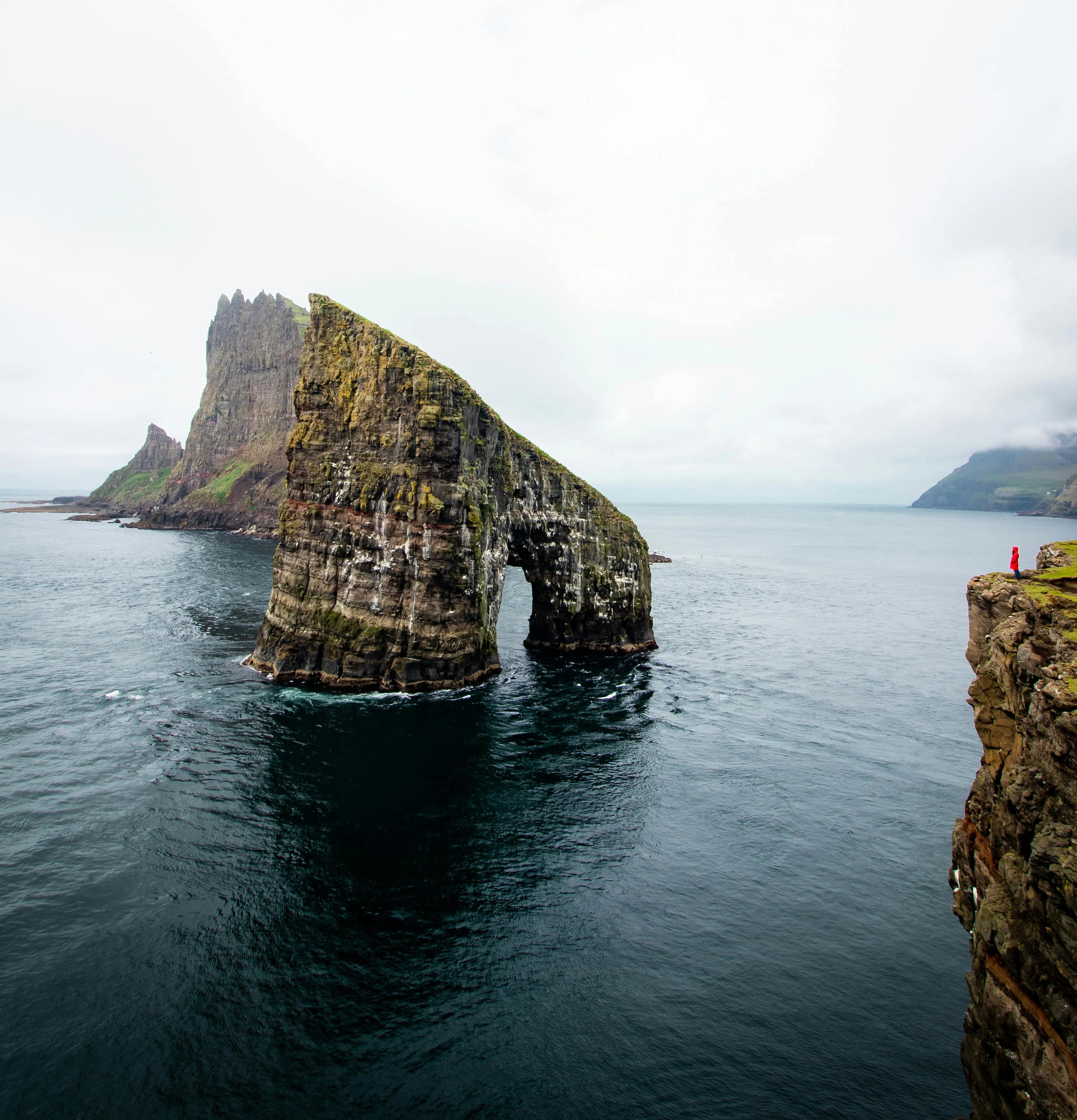 Tall Sea Cliffs Rise Above the Deep Blue Ocean Surface