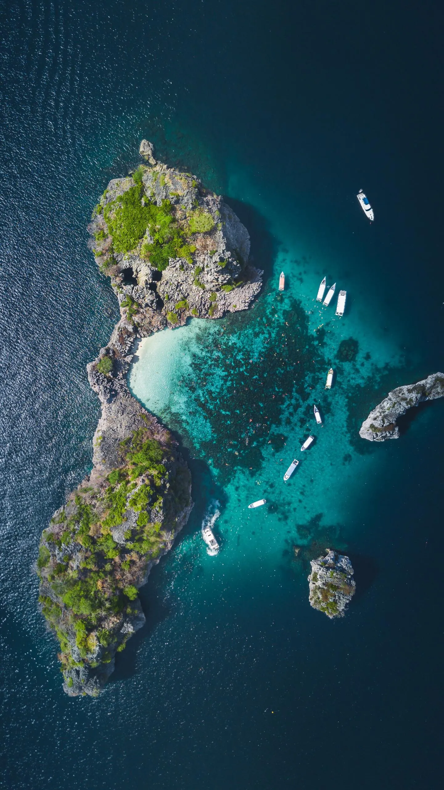 Top View of Tropical Islets Floating in the Deep Blue Sea