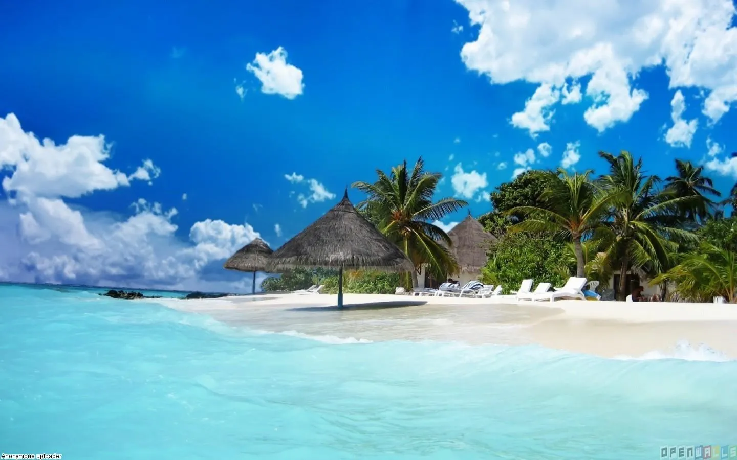 Tropical Island with Clear Skies and White Sand Wallpaper