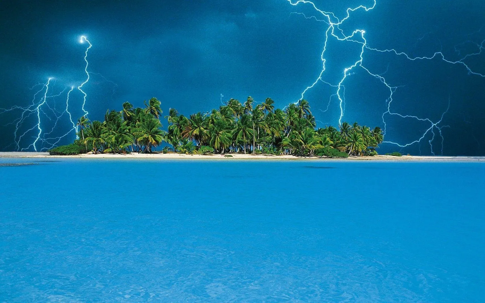 Tropical Island with Stormy Sky and Lightning Striking Water