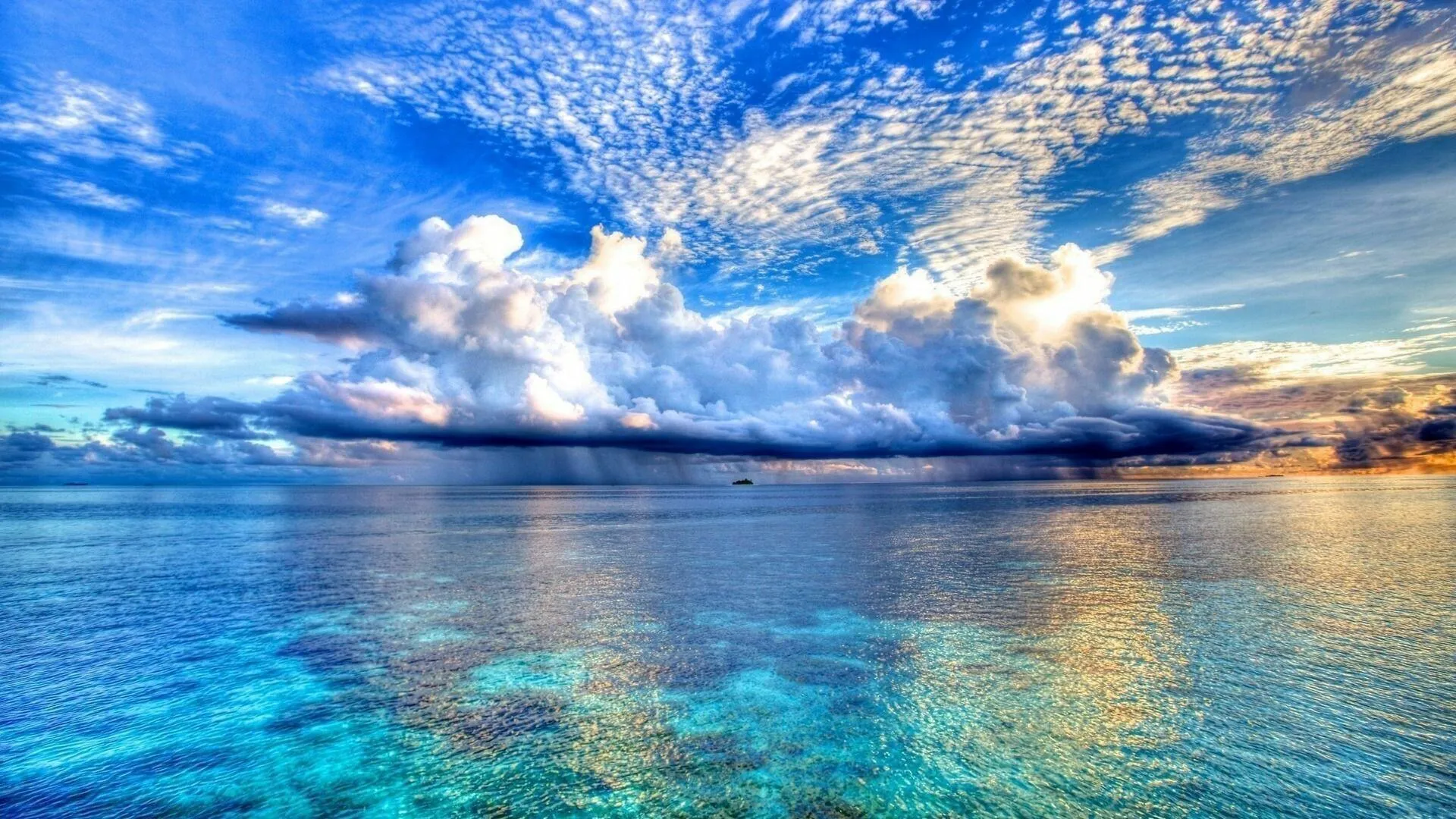 Wide Sky Reflections over the Still Ocean Water Wallpaper
