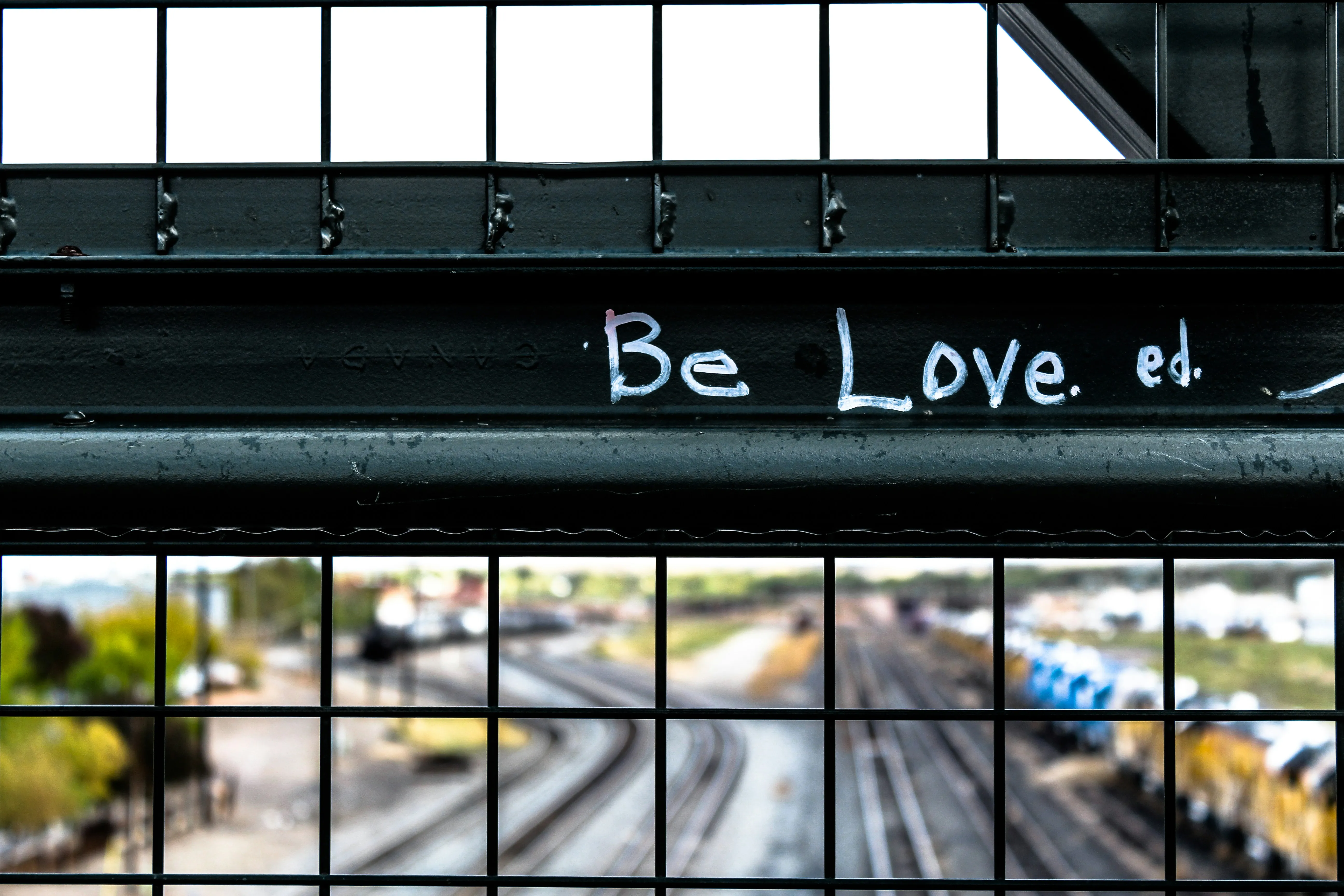 Be Love Message Reflected on Urban Glass Building Wallpaper