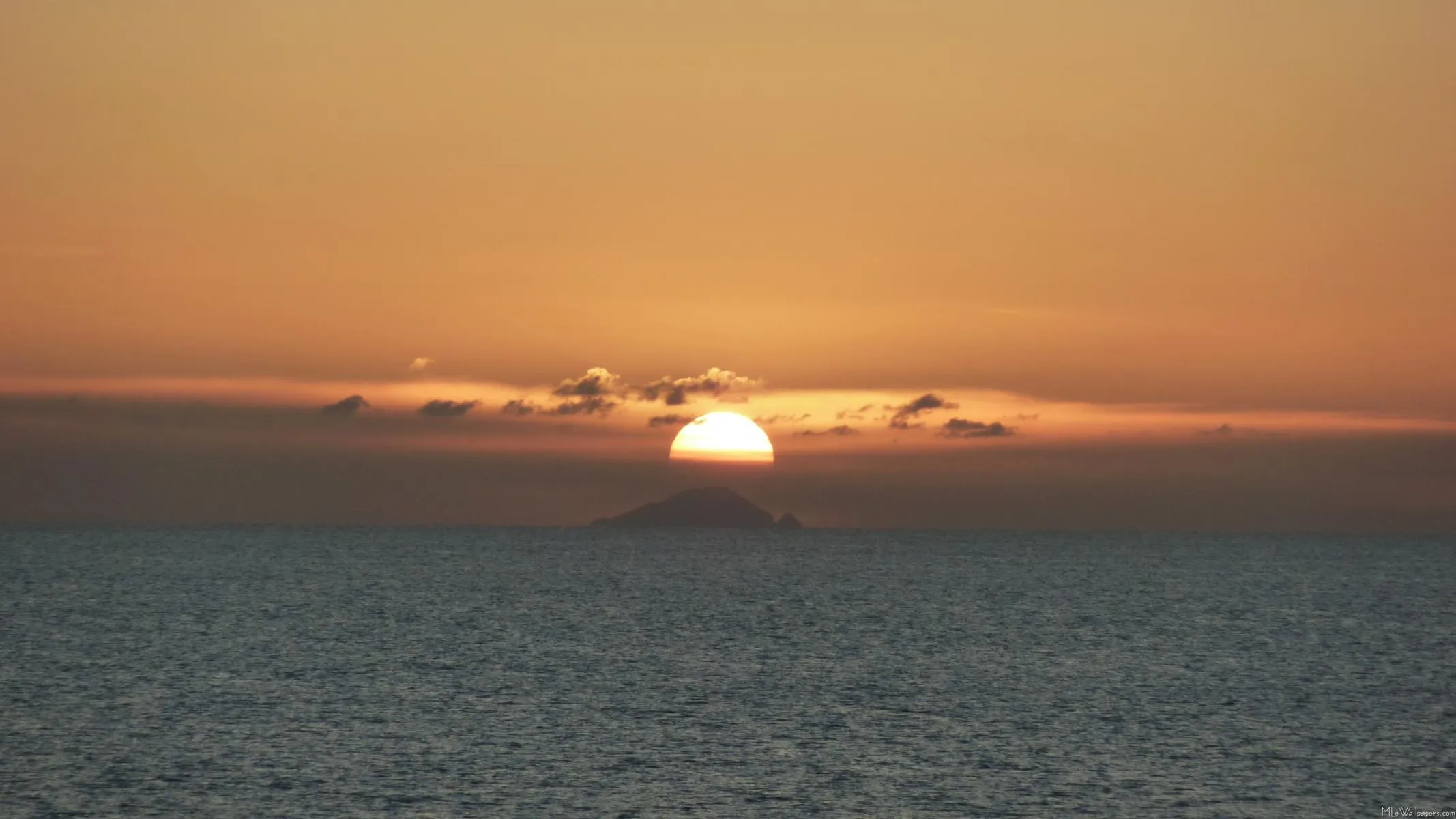 Beautiful Sunset Over Ocean Reflecting Warm Feelings