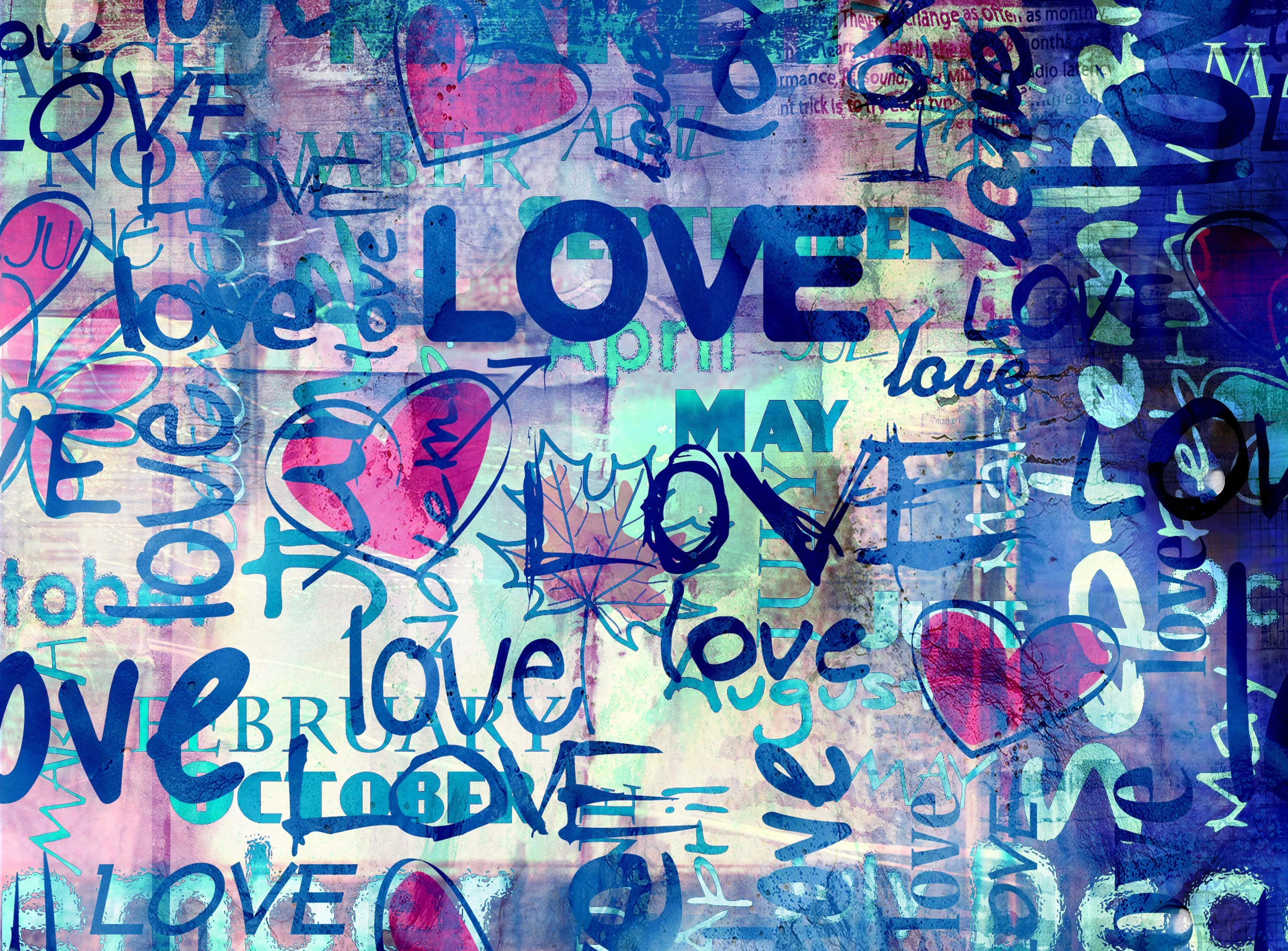 Blue Graffiti Wall Expressing the Word Love Wallpaper