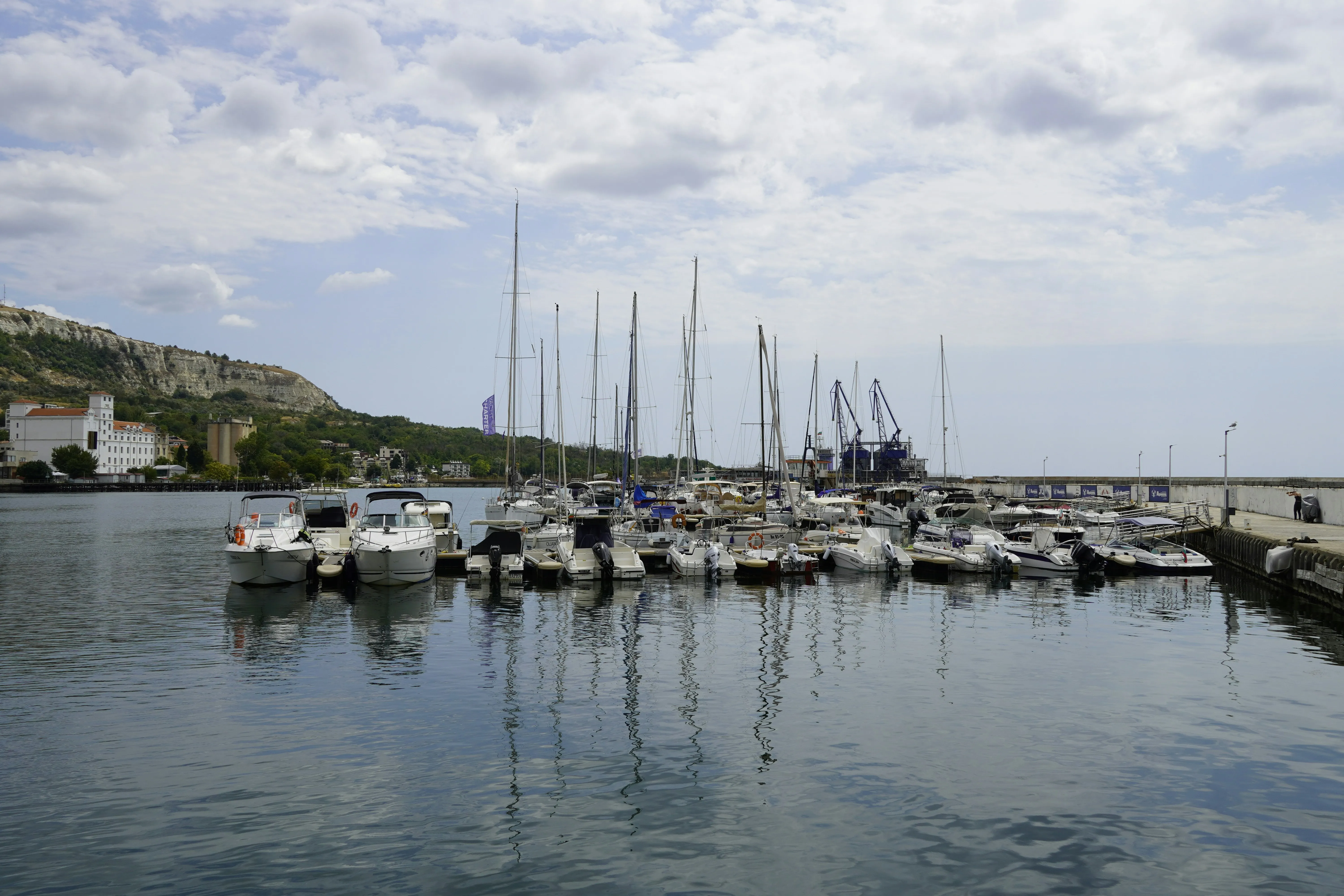 Boats Docked in Marina Under Bright Clear Sky Wallpaper