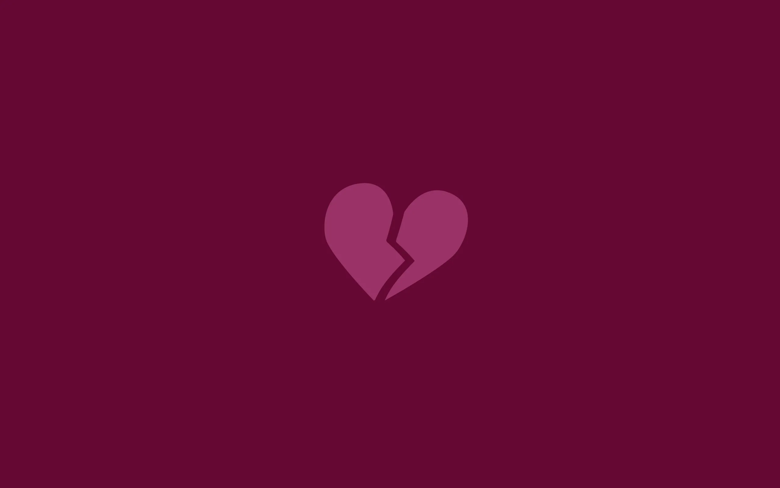 Broken Heart Symbol on Maroon Background of Pain Wallpaper
