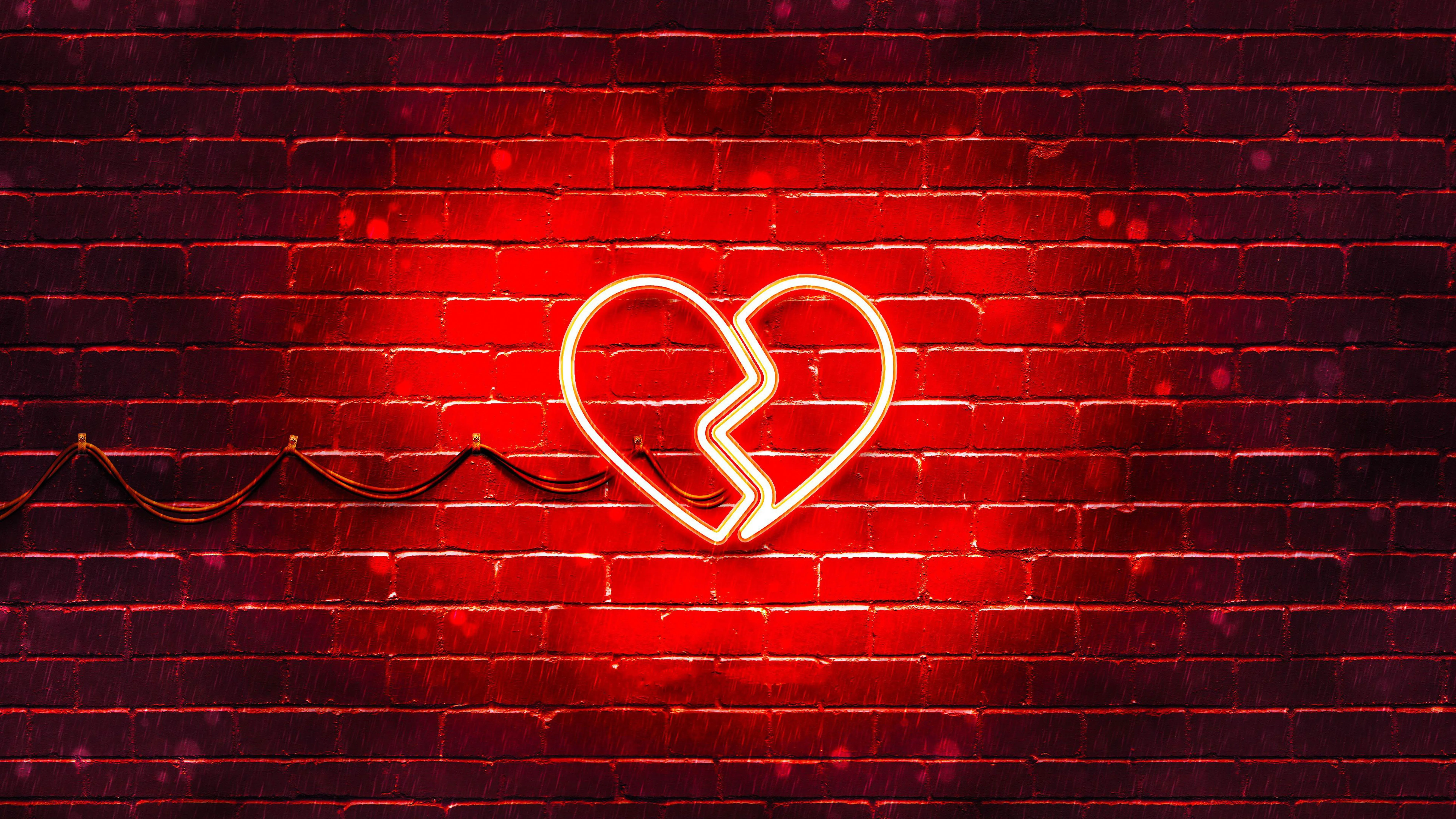 Broken Heart Symbolizing Pain and Healing in Love Wallpaper