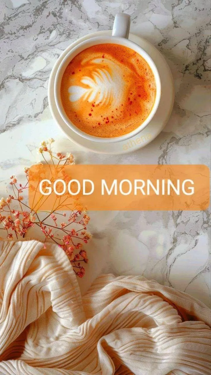 Coffee with Latte Art and Good Morning Text in Cozy Setting