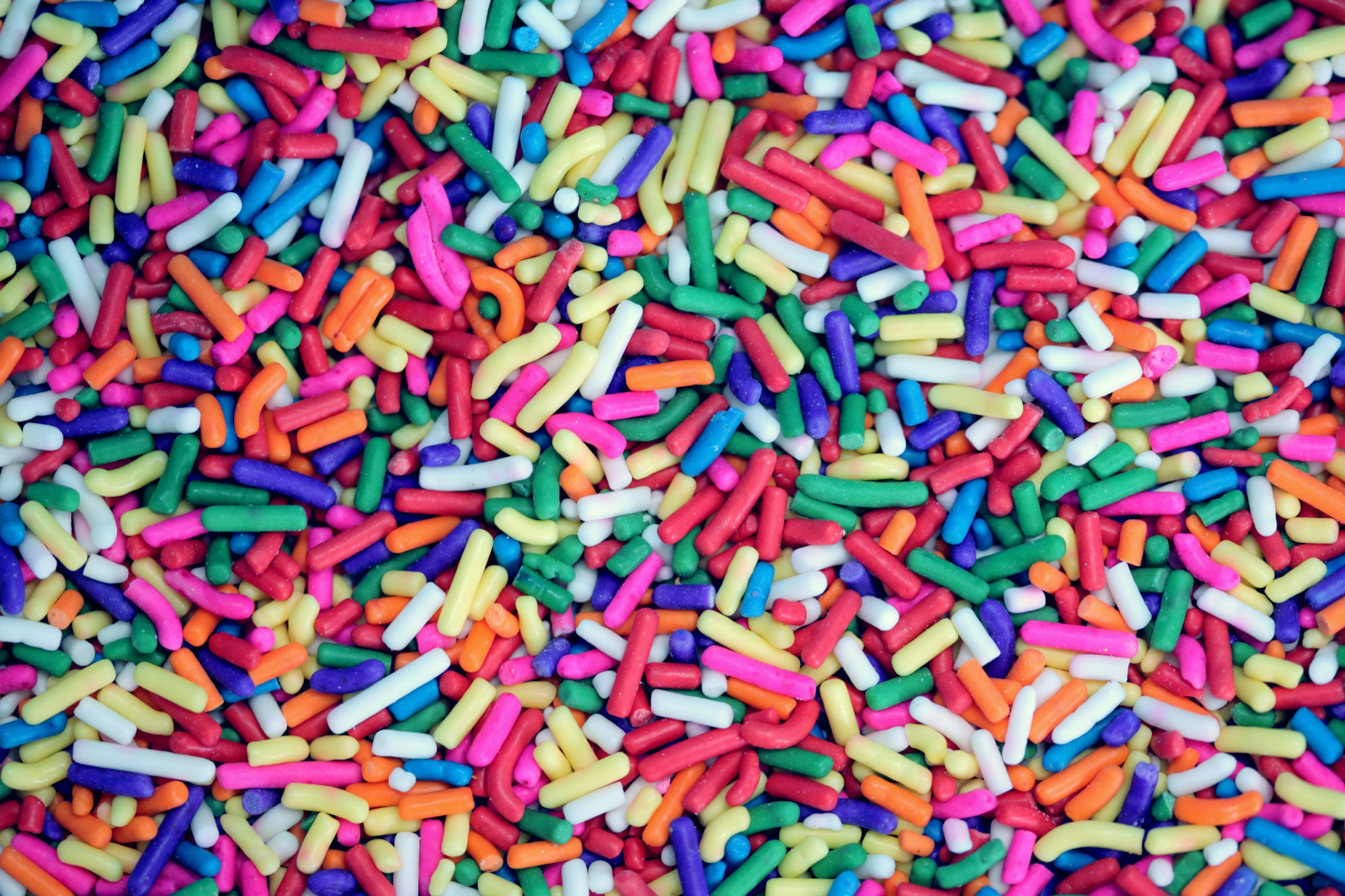 Colorful Candy Sprinkles Scattered in Bright Pattern