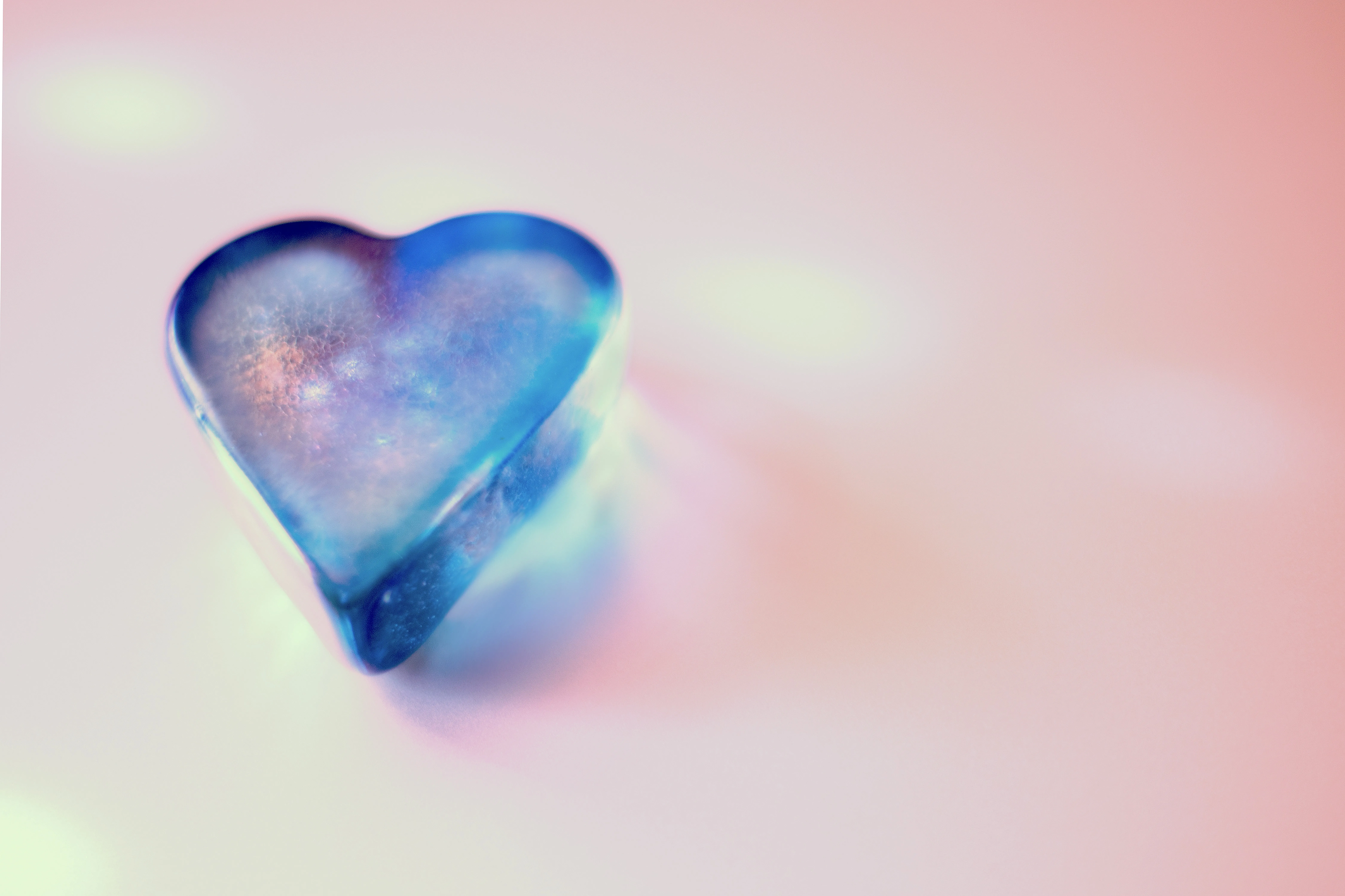 Colorful Glass Heart Symbolizing Joyful Romance Wallpaper