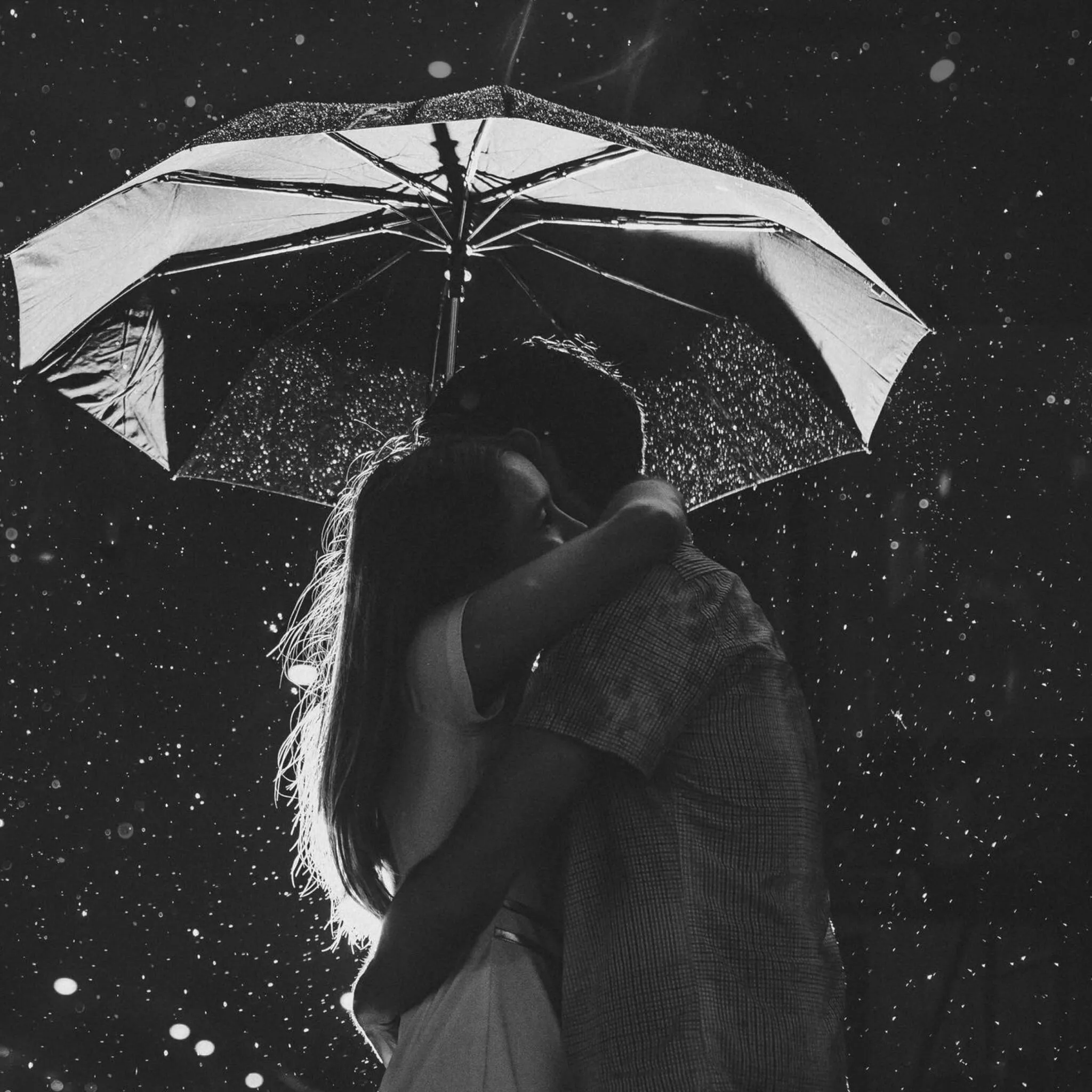 Couple Hugging in Rain Portraying Deep Romantic Bond