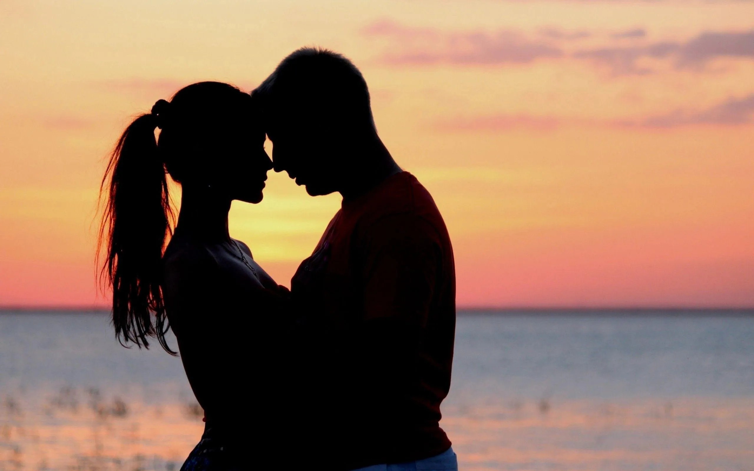 Couple Kissing at Sunset Showing True Emotion 4K Image