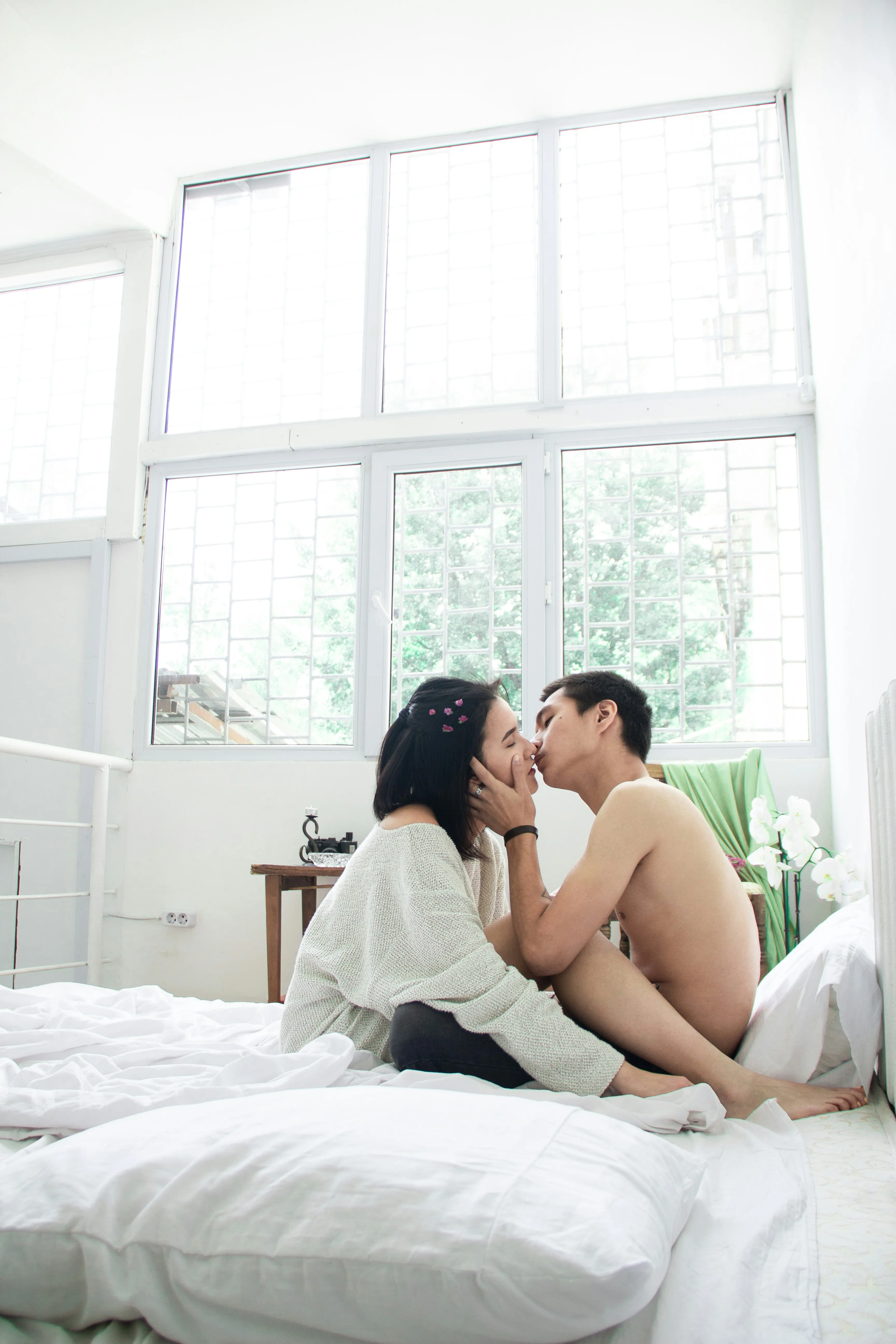 Couple Sharing a Loving Morning Moment Indoors Wallpaper