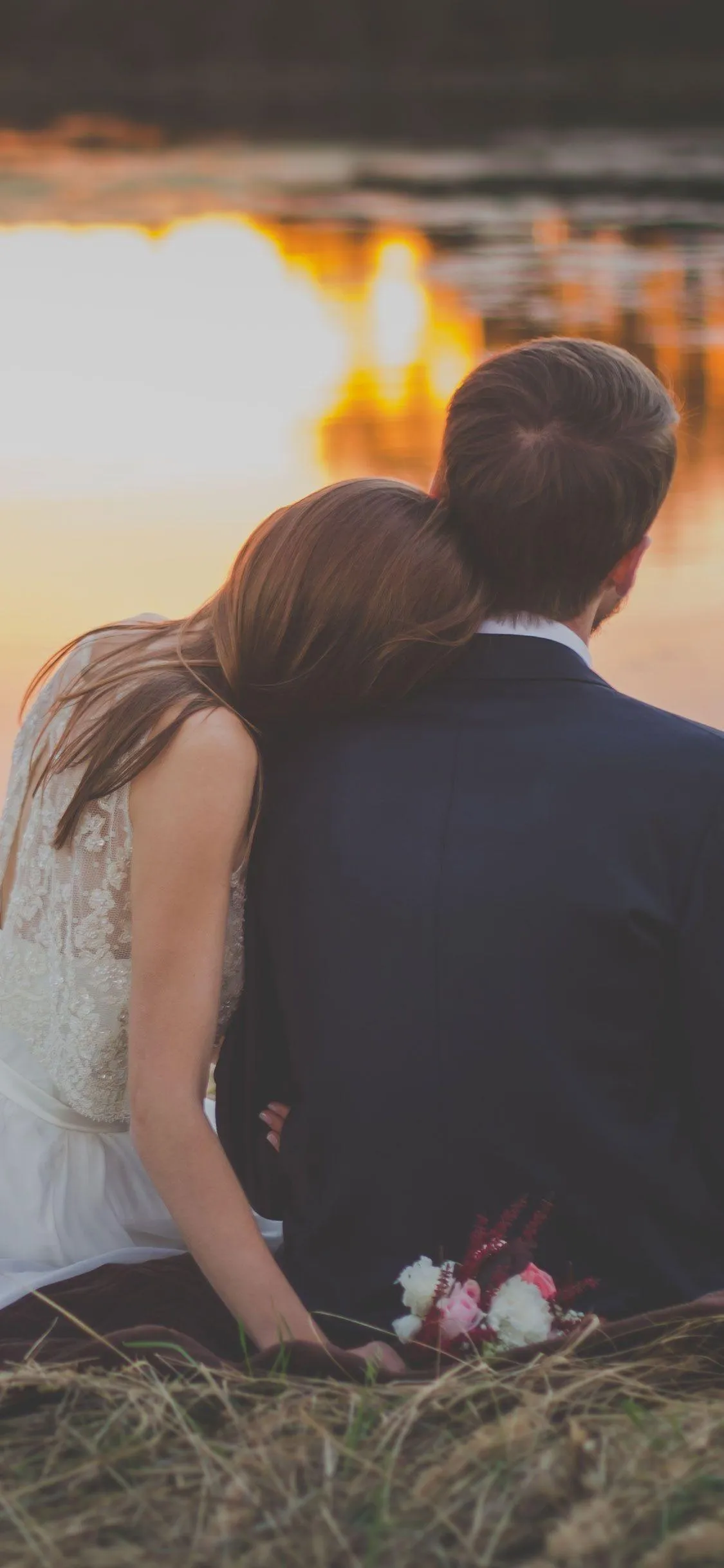 Couple Sitting Together Embracing Warm Affection 4K Image