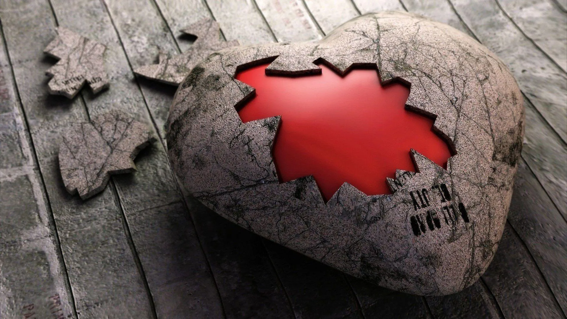Cracked Stone Heart with Red Paint Symbolizing Pain