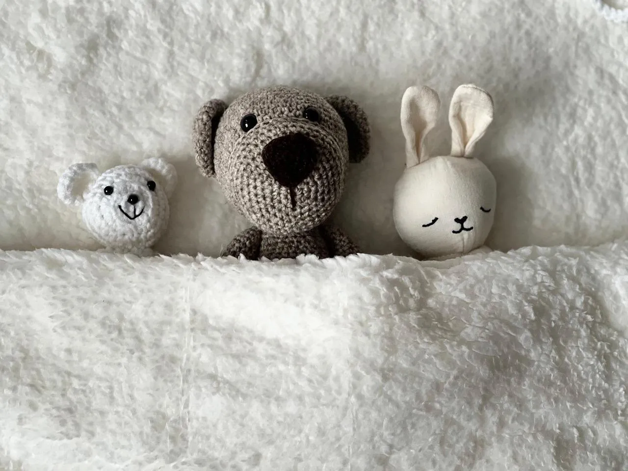 Cute Stuffed Toys Displaying Comfort and Affection Wallpaper