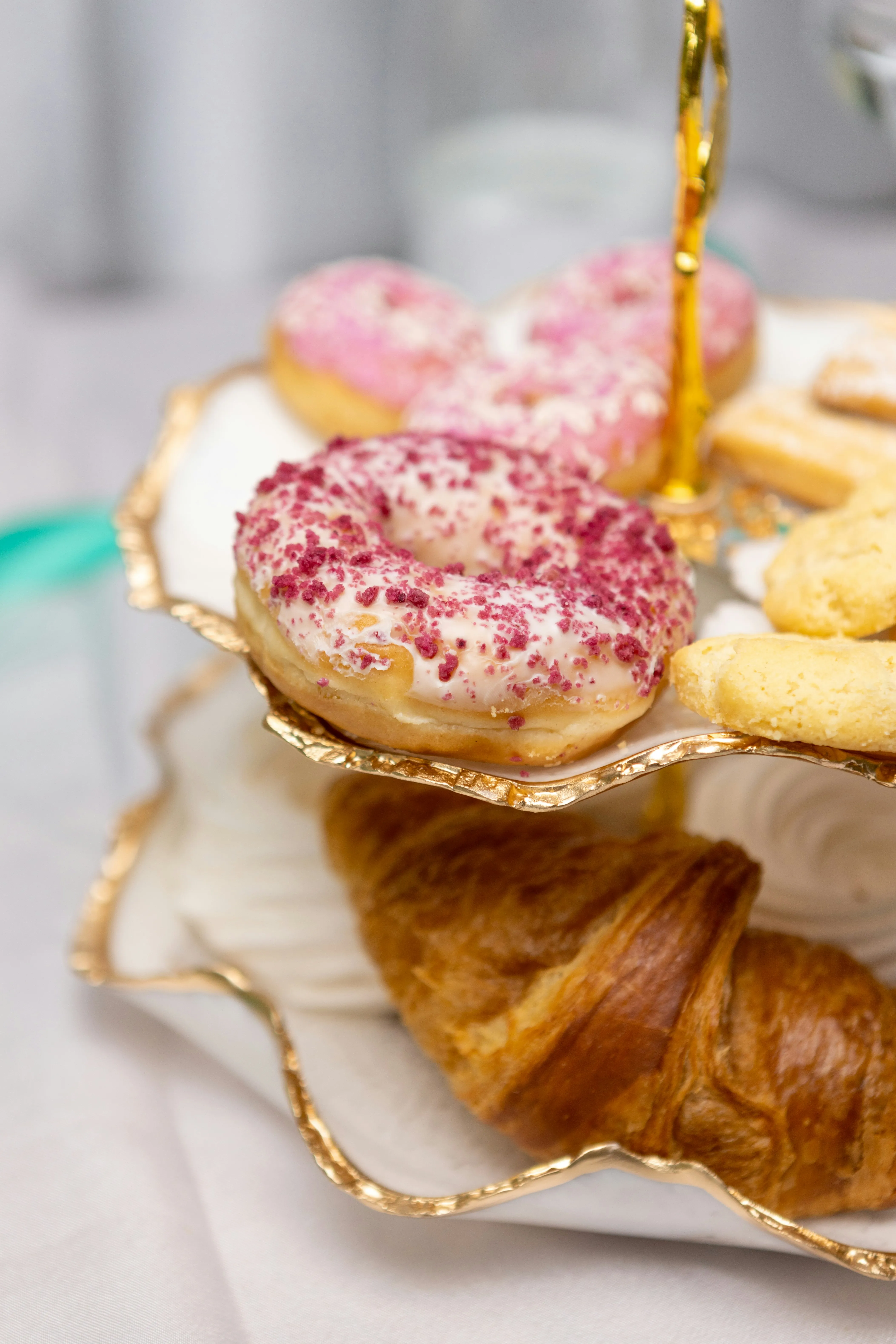 Donuts and Croissants on Table for Sweet Morning Joy