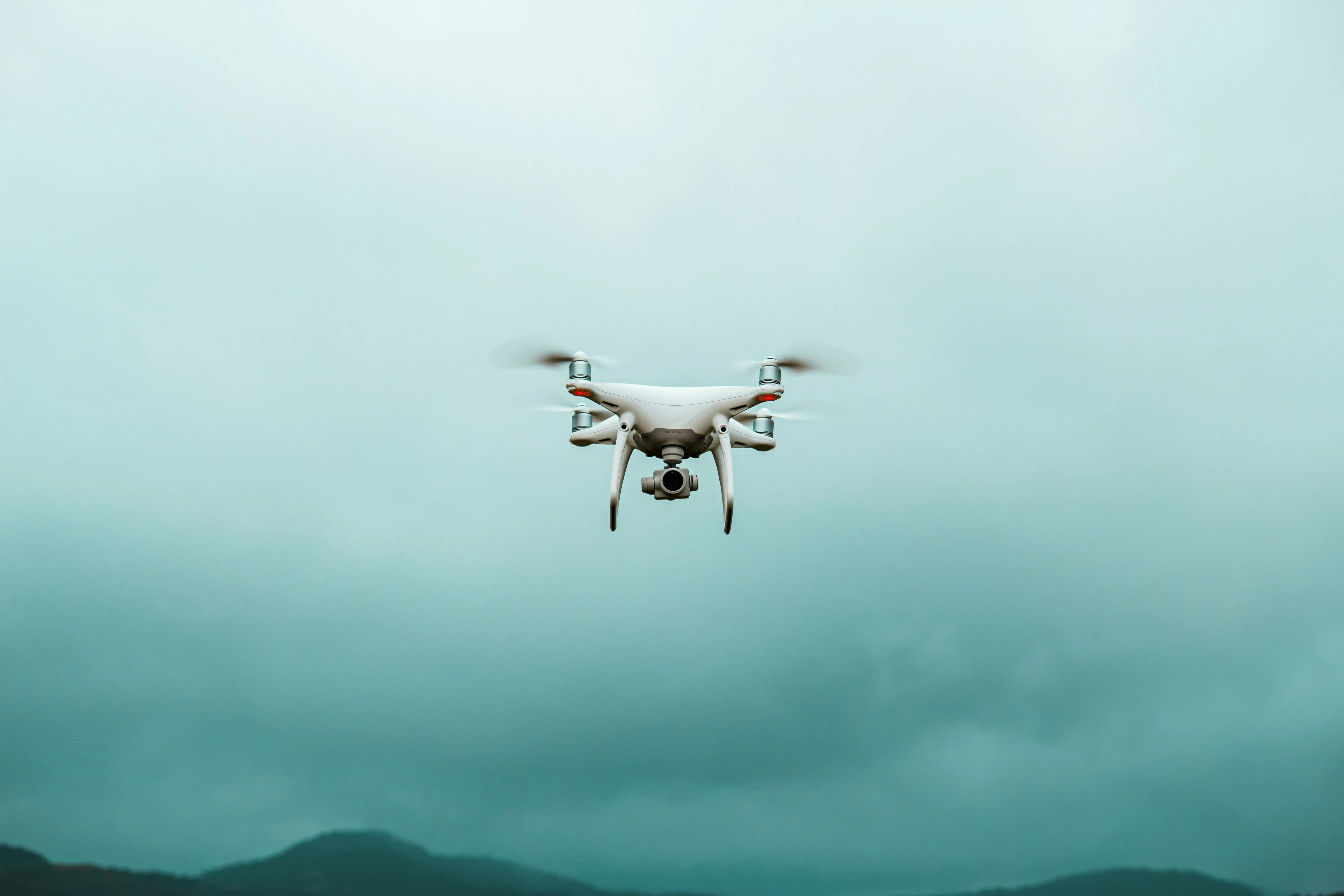 Drone Flying High Over the Sky of Open Freedom Wallpaper