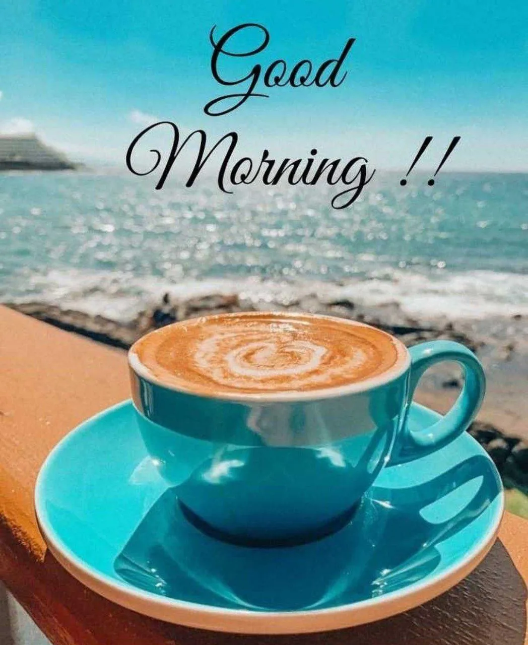 Elegant Blue Tea Cup Greeting for a Fresh Morning Image