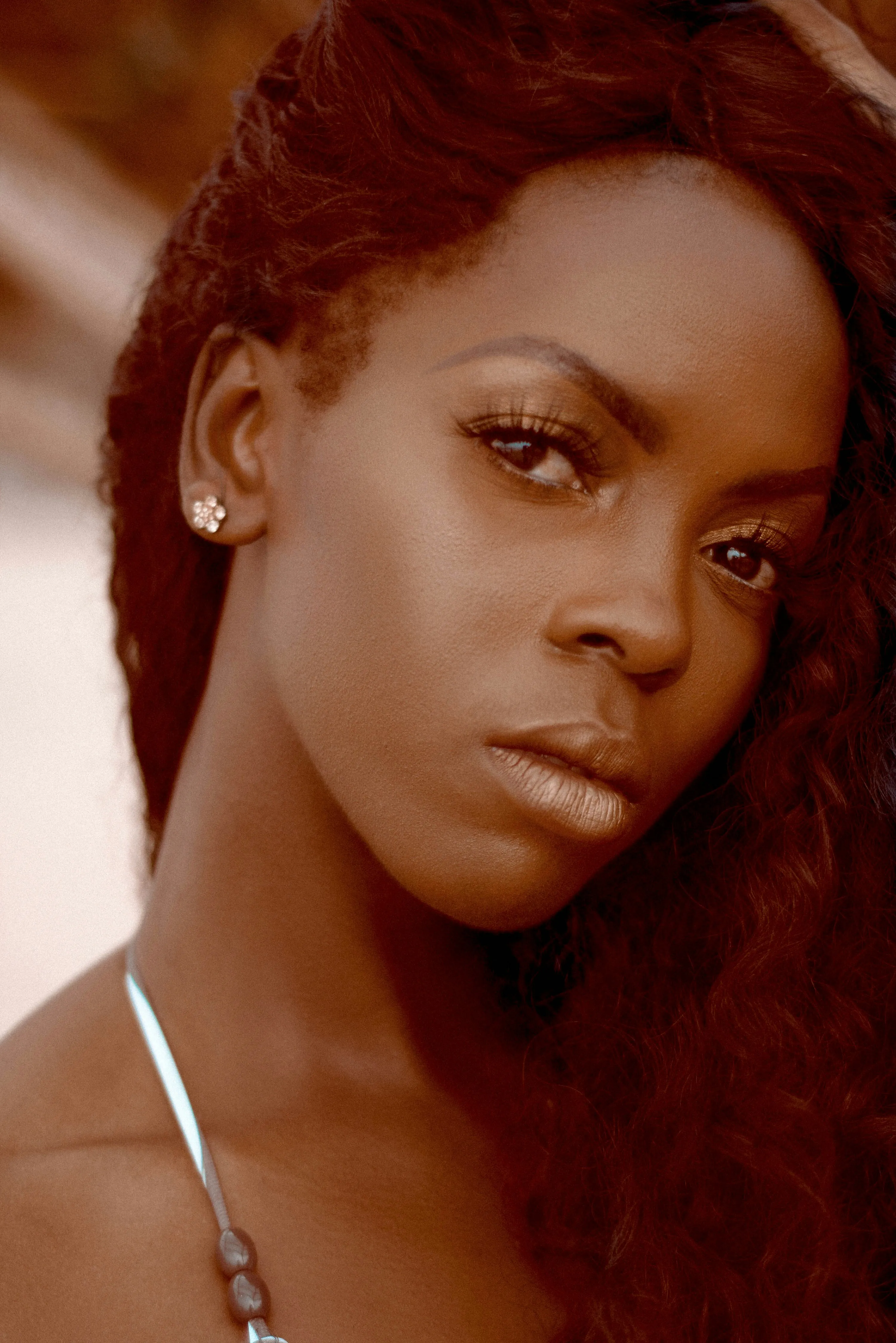 Elegant Portrait of Woman with Calm Expression Wallpaper