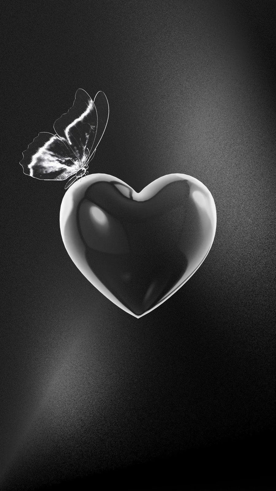 Elegant Silver Heart on Black Symbolizing Trust Wallpaper
