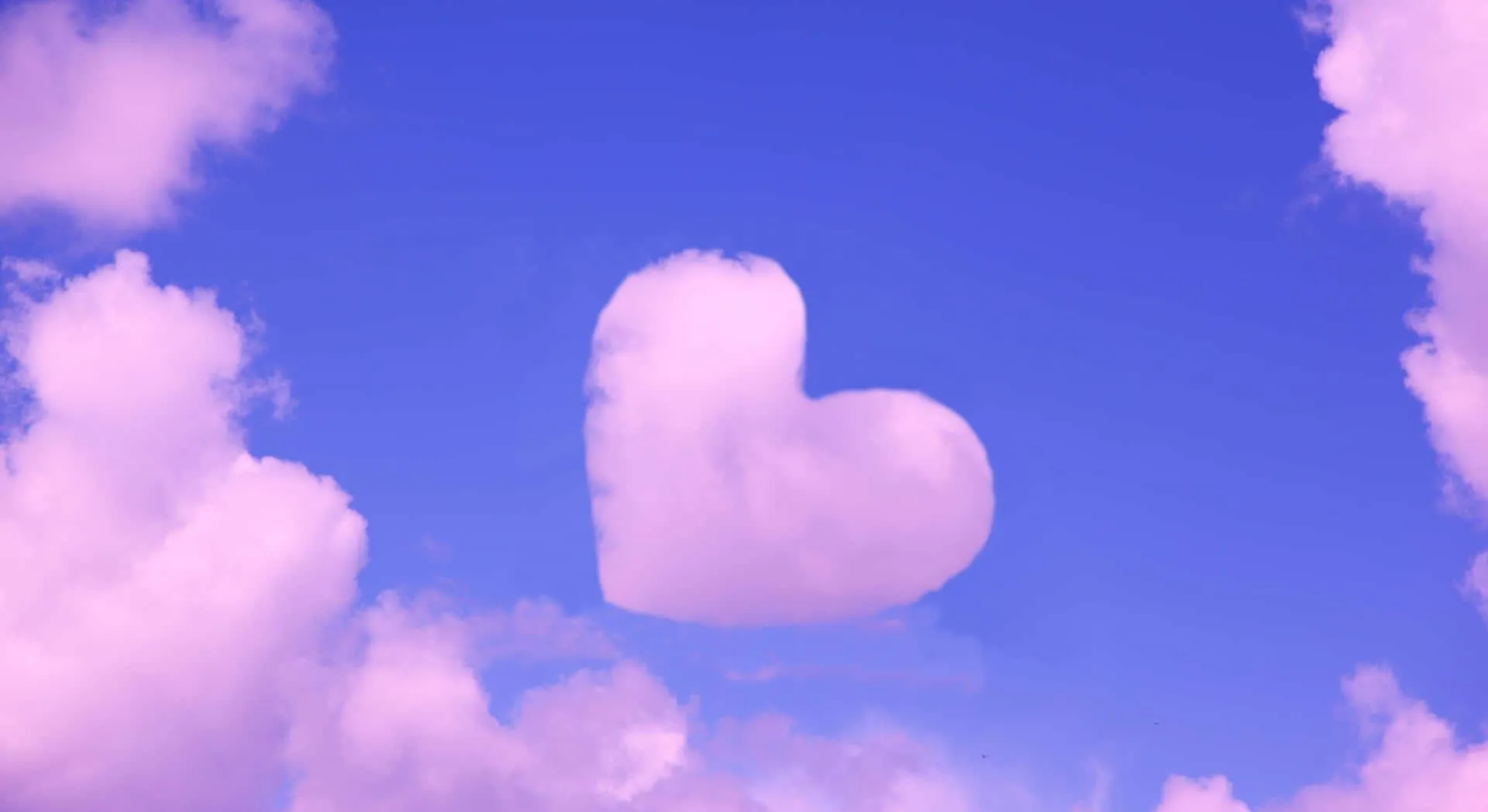Fluffy Cloud Heart Floating in Clear Blue Sky Wallpaper