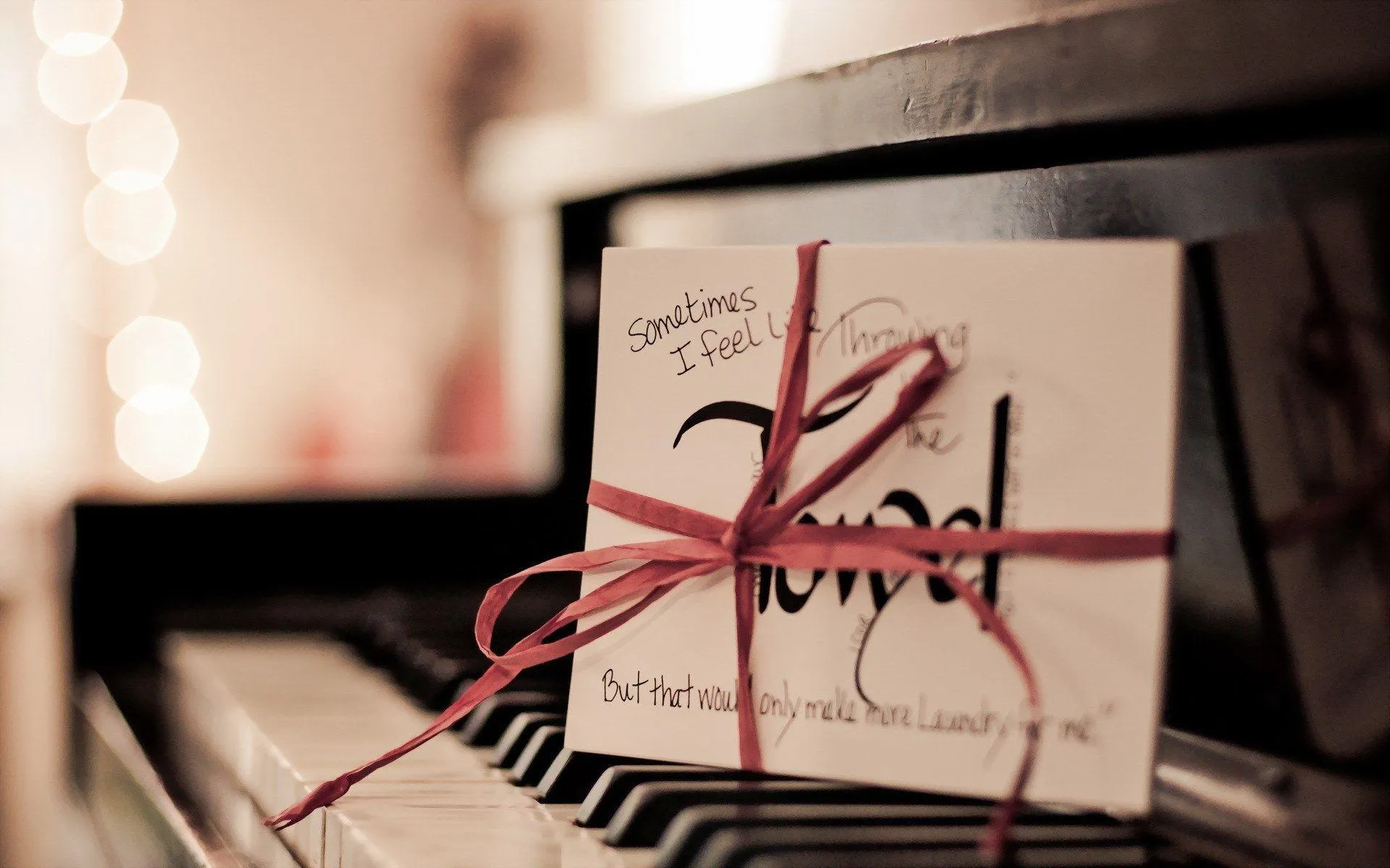 Gift Card with Ribbon Representing Sweet Love Wallpaper