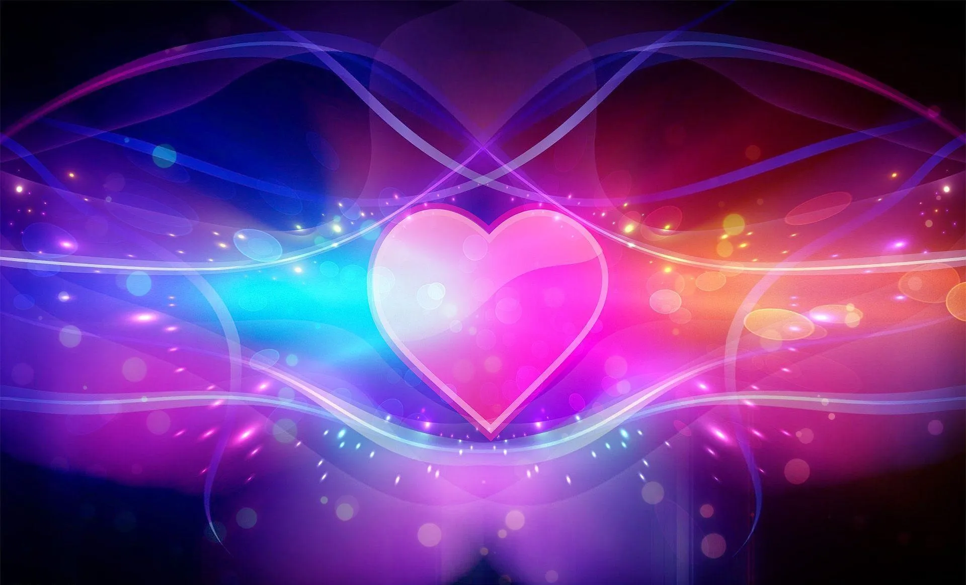 Glowing Heart Energy in Abstract Colorful Motion Wallpaper