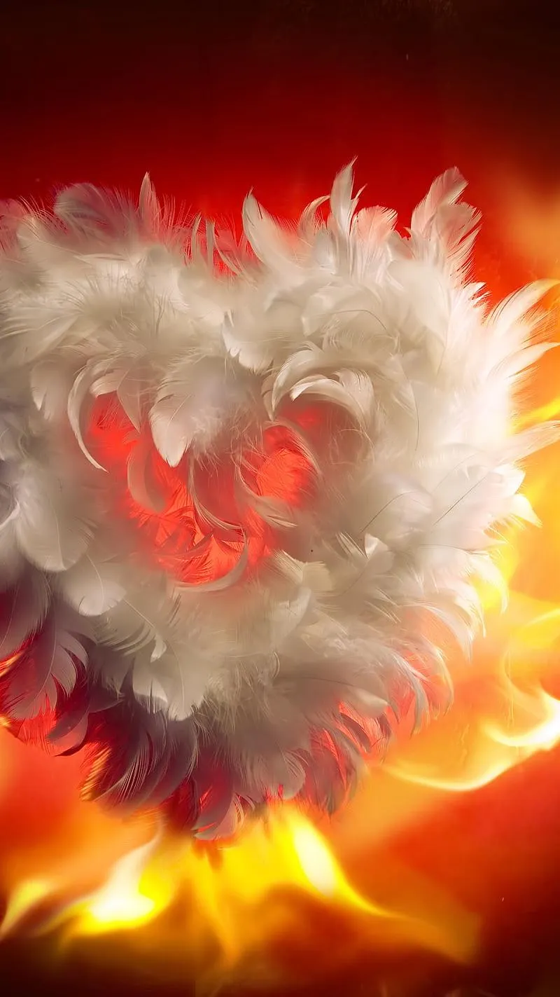 Glowing Heart of Fire with Feather Symbolizing True Passion