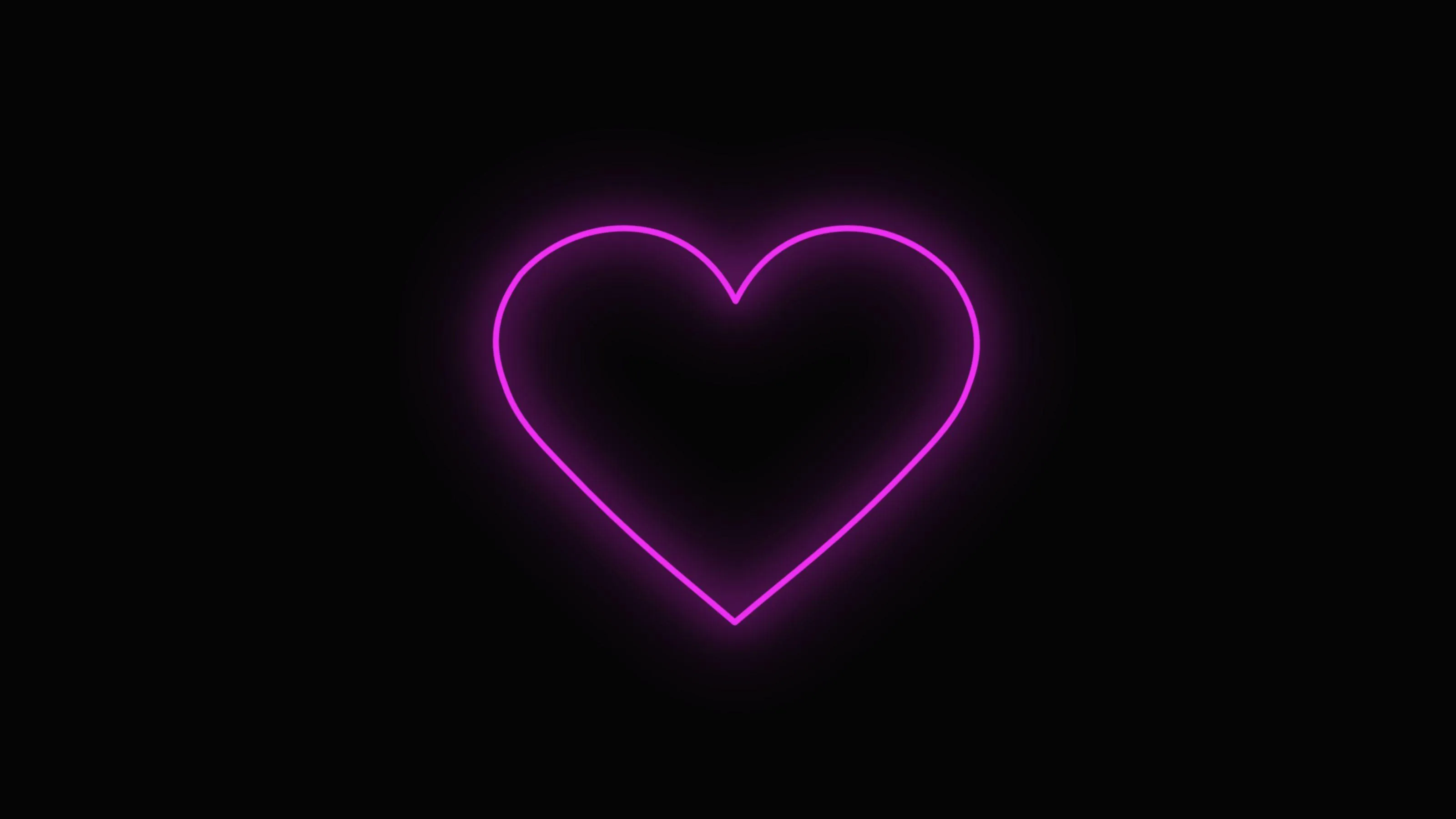 Glowing Heart on Black Background of Pure Emotion Wallpaper