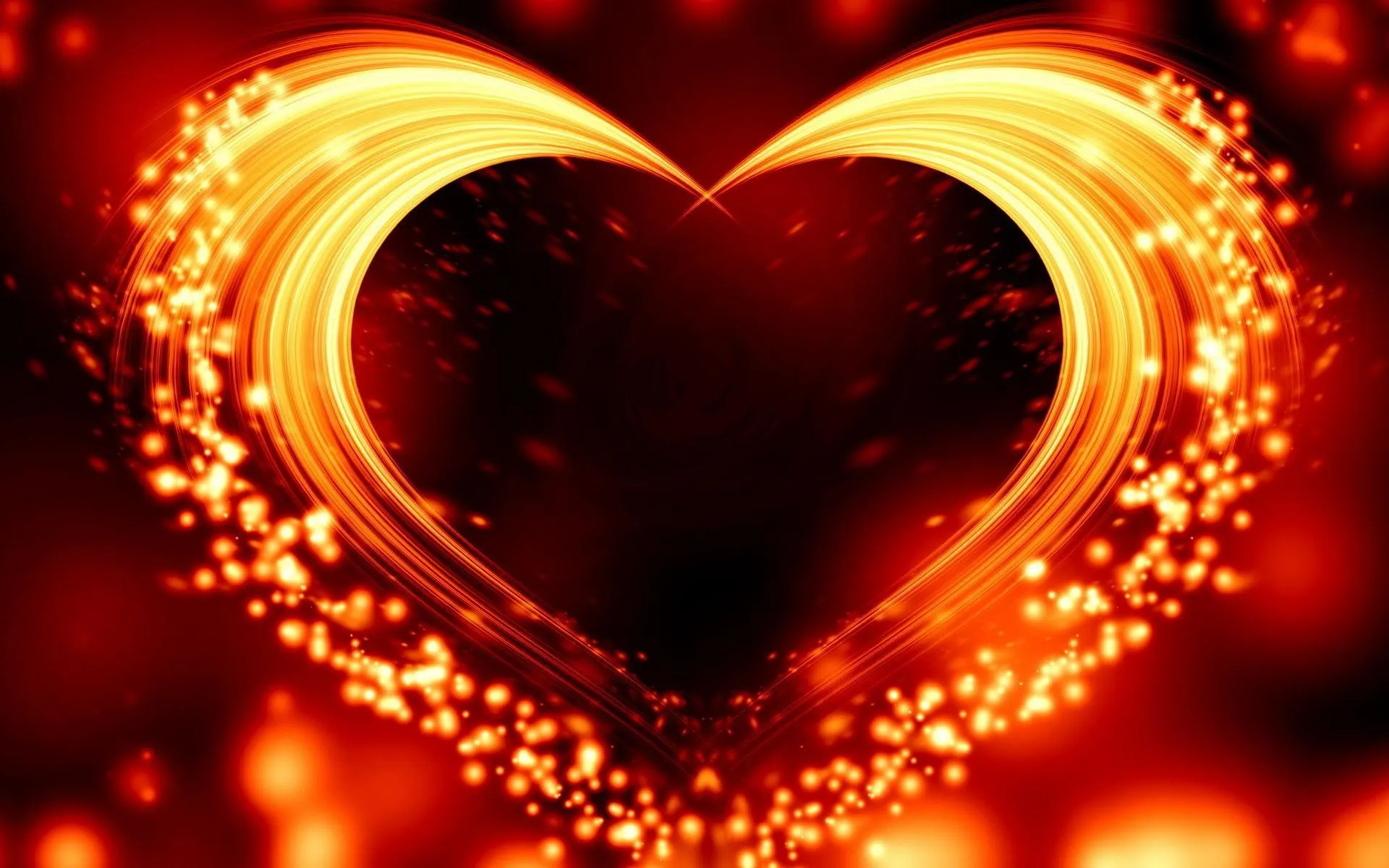 Golden Heart Surrounded by Glowing Particles Wallpaper