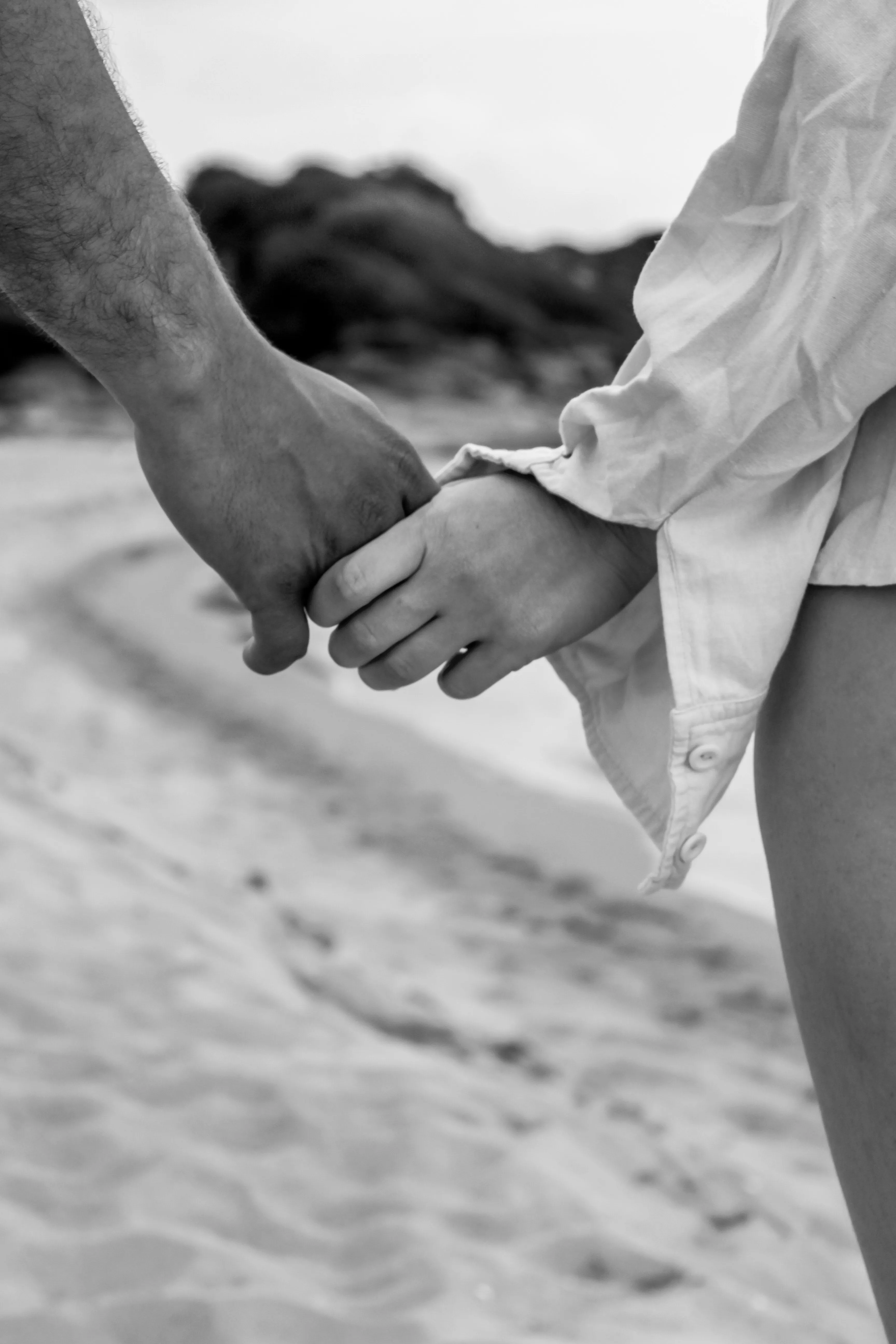 Hands Joined Together Promising Eternal Support Wallpaper