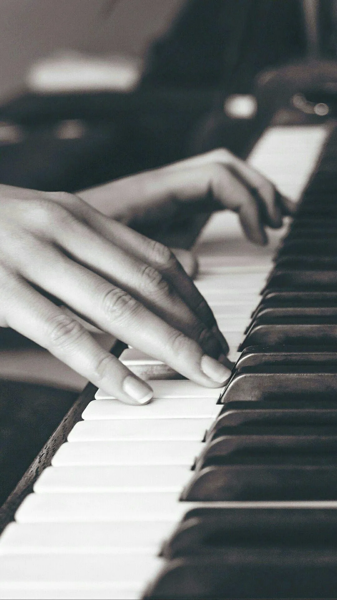 Hands Playing Piano Expressing Musical Emotion Wallpaper