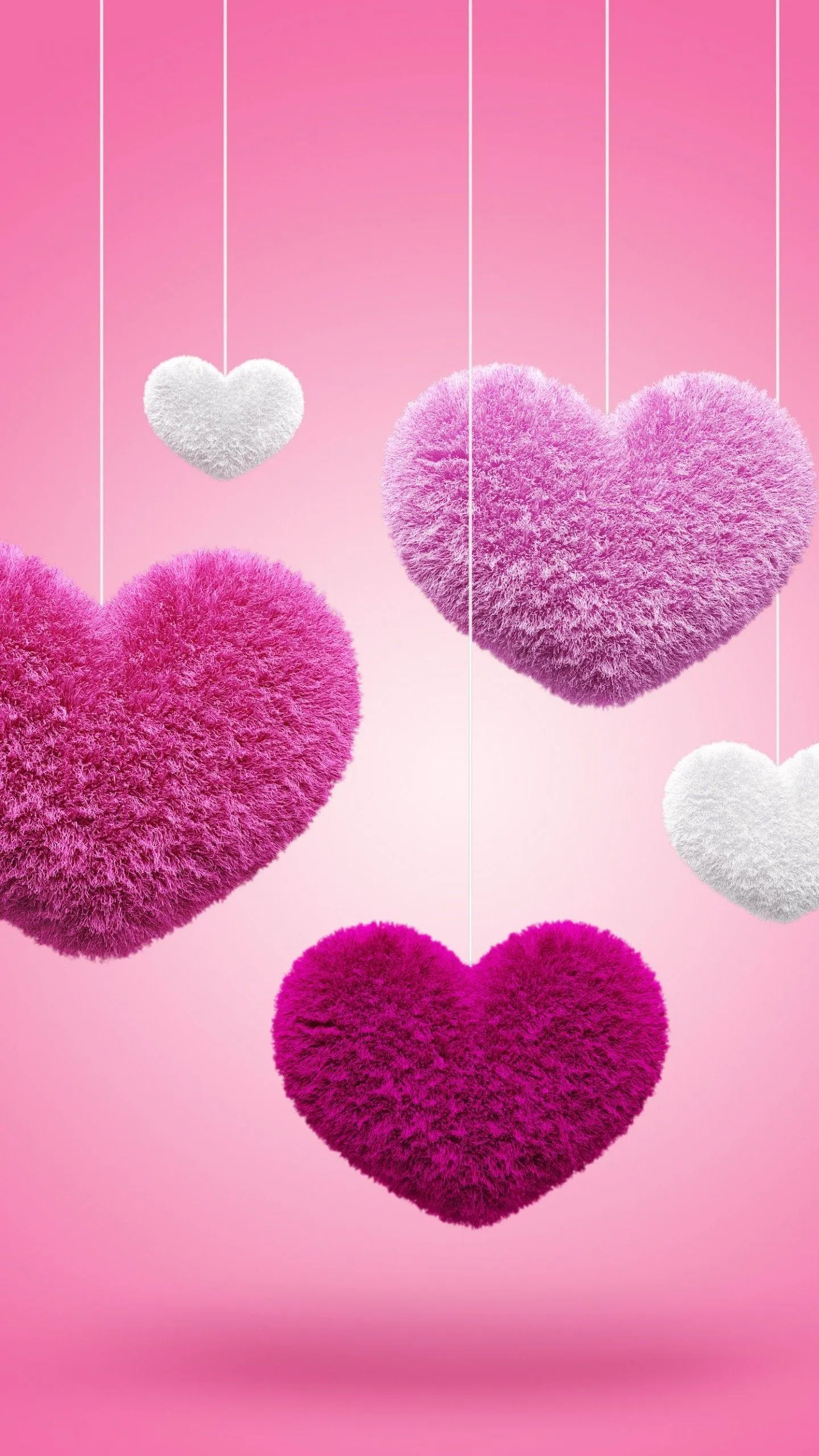 Hanging Pink Hearts Representing Sweet Affection Wallpaper
