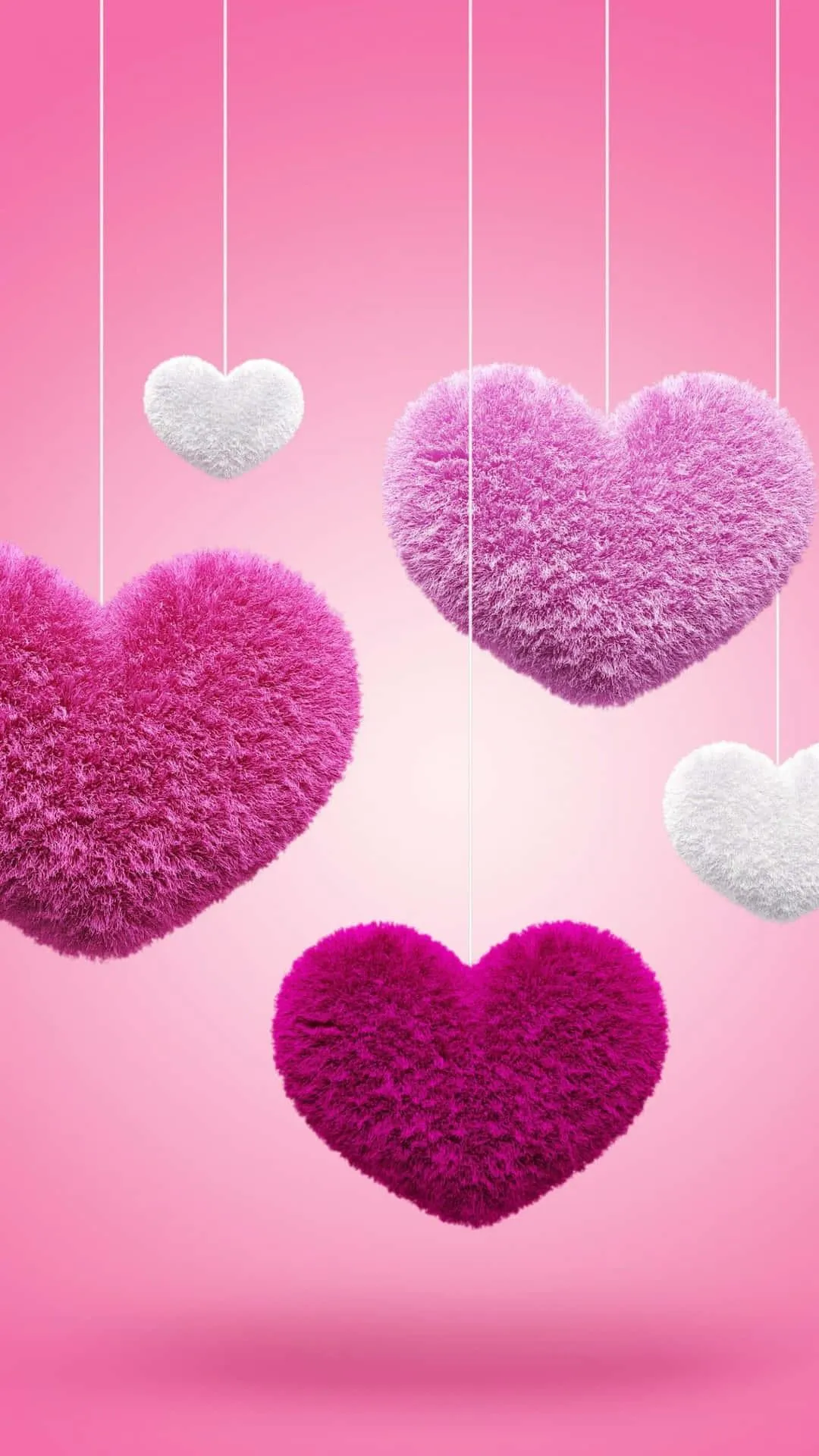 Hanging Pink Hearts Showing Care and Affection Wallpaper
