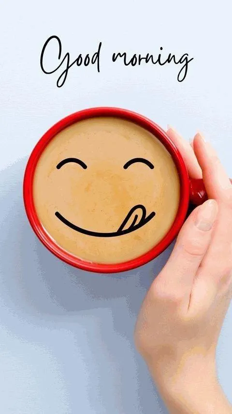 Happy Face Sign Held By Hand with Good Morning Message