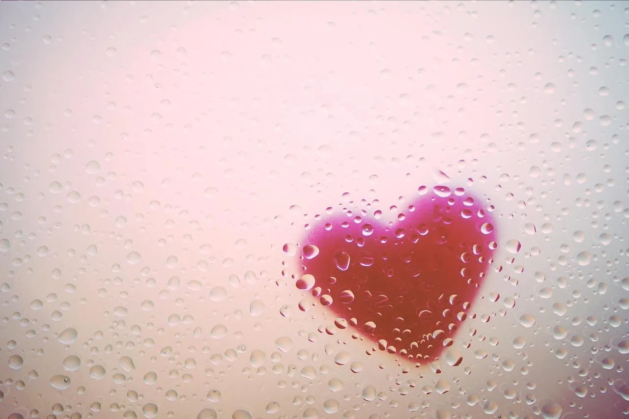 Heart Shape on Glass Window Expressing Emotion Wallpaper