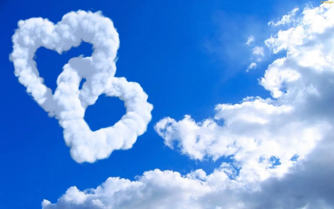 Heart Shaped Clouds Forming Love Symbol in Sky Wallpaper