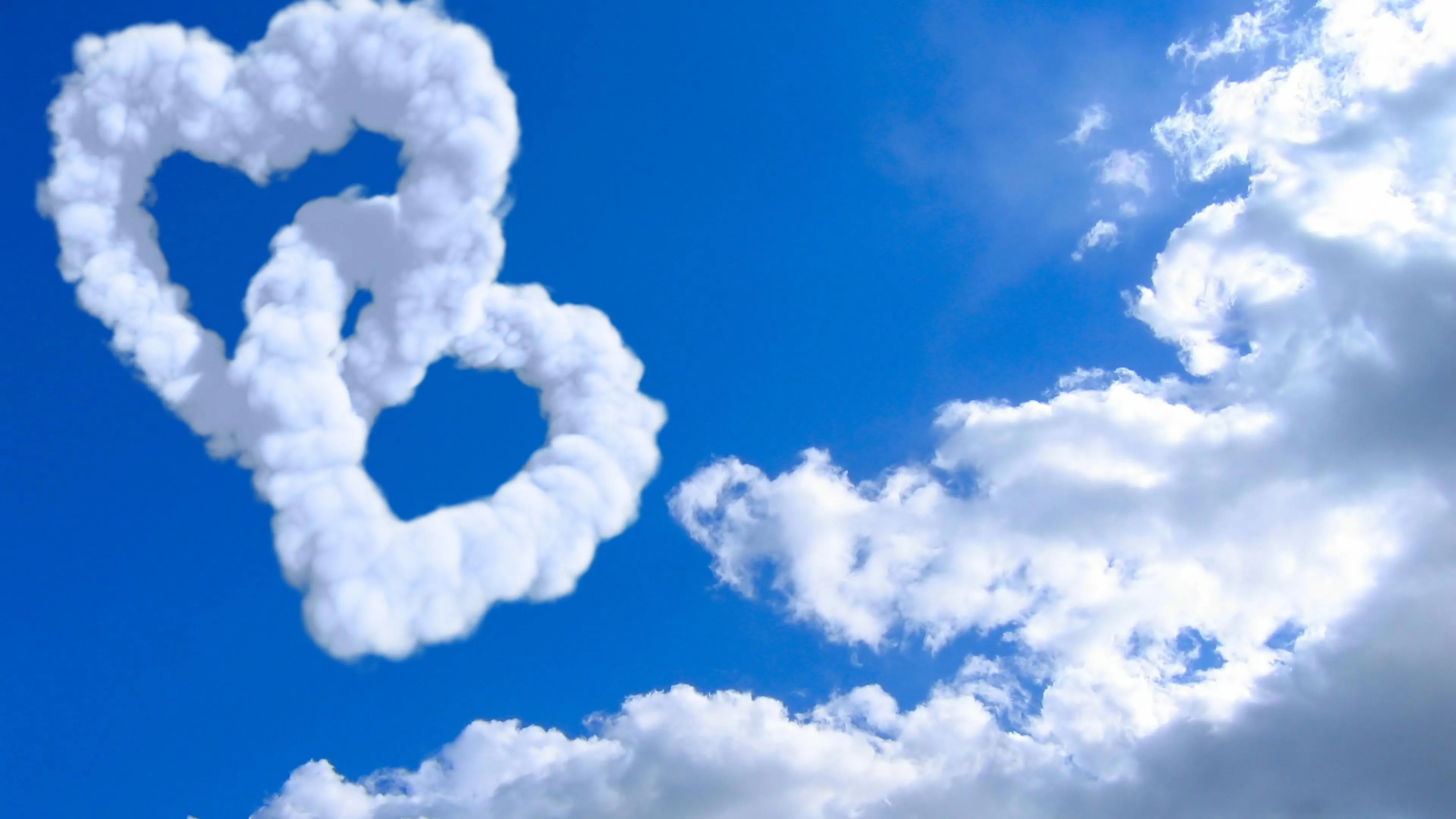 Heart Shaped Clouds in Sky Portraying Pure Love Wallpaper